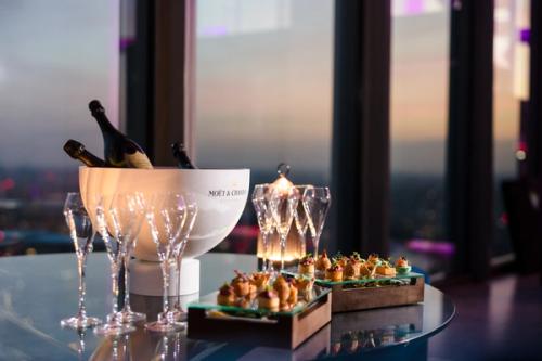 Champagne and canapes on a table