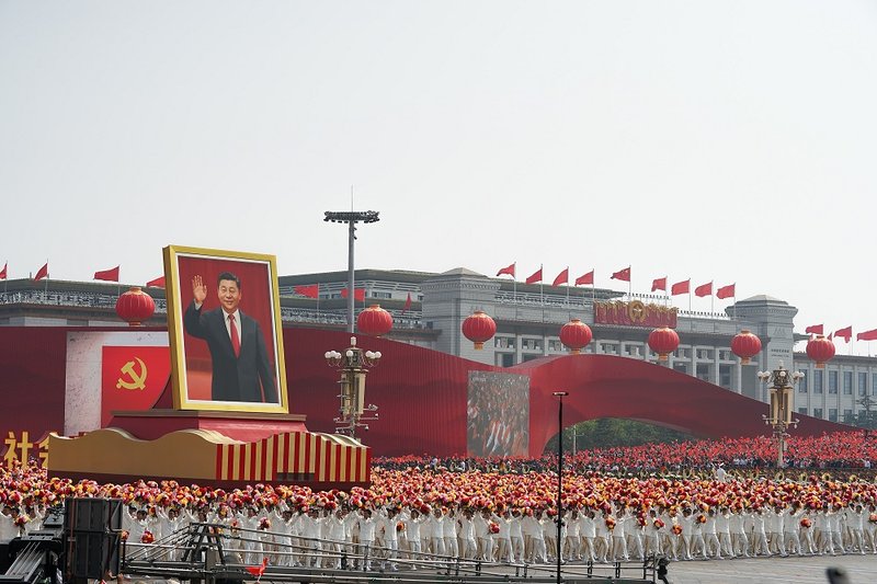 A portrait of Chinese President Xi Jinping is carried during the parade for the 70th anniversary of the establishment of the People's Republic of China on 1 October 2019 in Tiananmen Square, Beijing, China