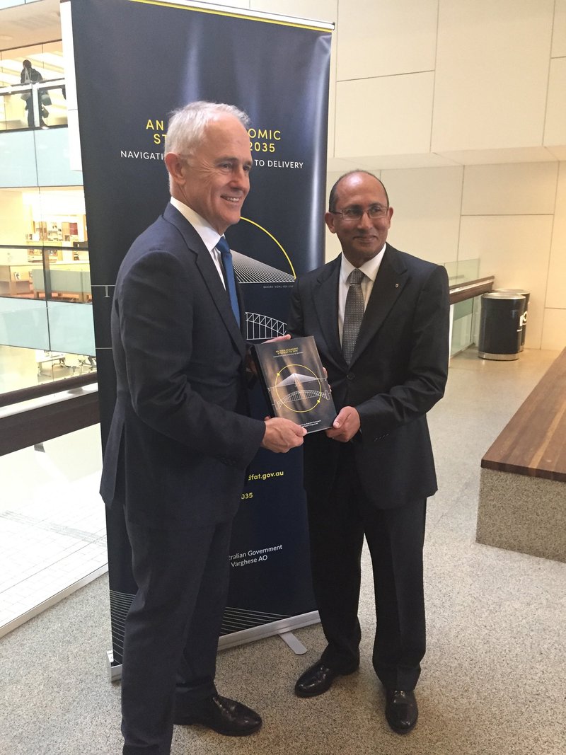 Prime Minister Malcolm Turnbull releases the India Economic Strategy 2035 byformer DFAT Secretary and ex-High Commissioner to India, Peter Varghese. Image: DFAT/Twitter.com.
