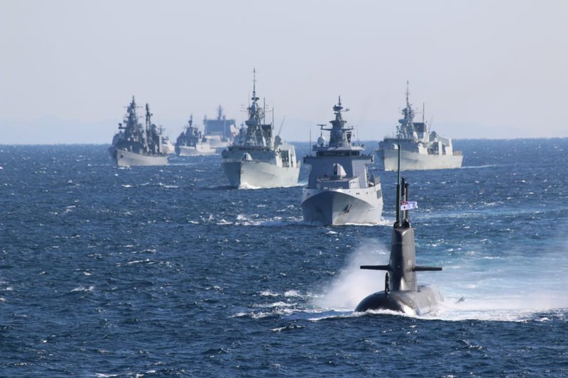 Australian Collins class submarine HMAS Farncomb sails with navy ships from around the region during the Japan Maritime Self-Defence Force's International Fleet Review 2022 off Yokosuka, Japan (Aaron Robinson/Defence Department)