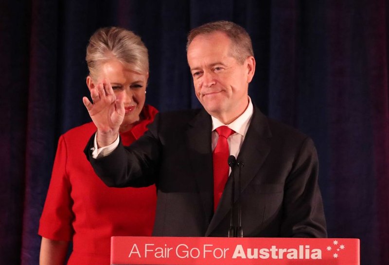 Labor leader Bill Shorten, flanked by his wife Chloe