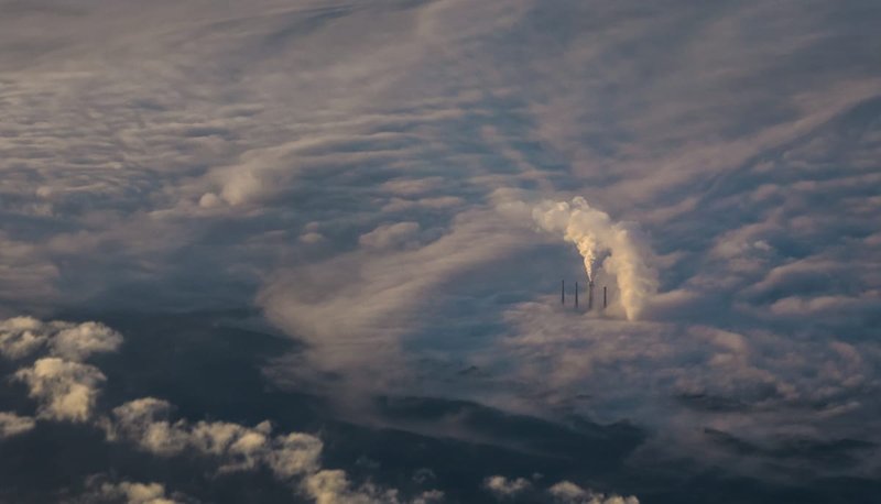 Firms should be charged for their contribution to pollution, including carbon pollution, by the governments in the countries where they generate this pollution (Nik Shuliahin/Unsplash)