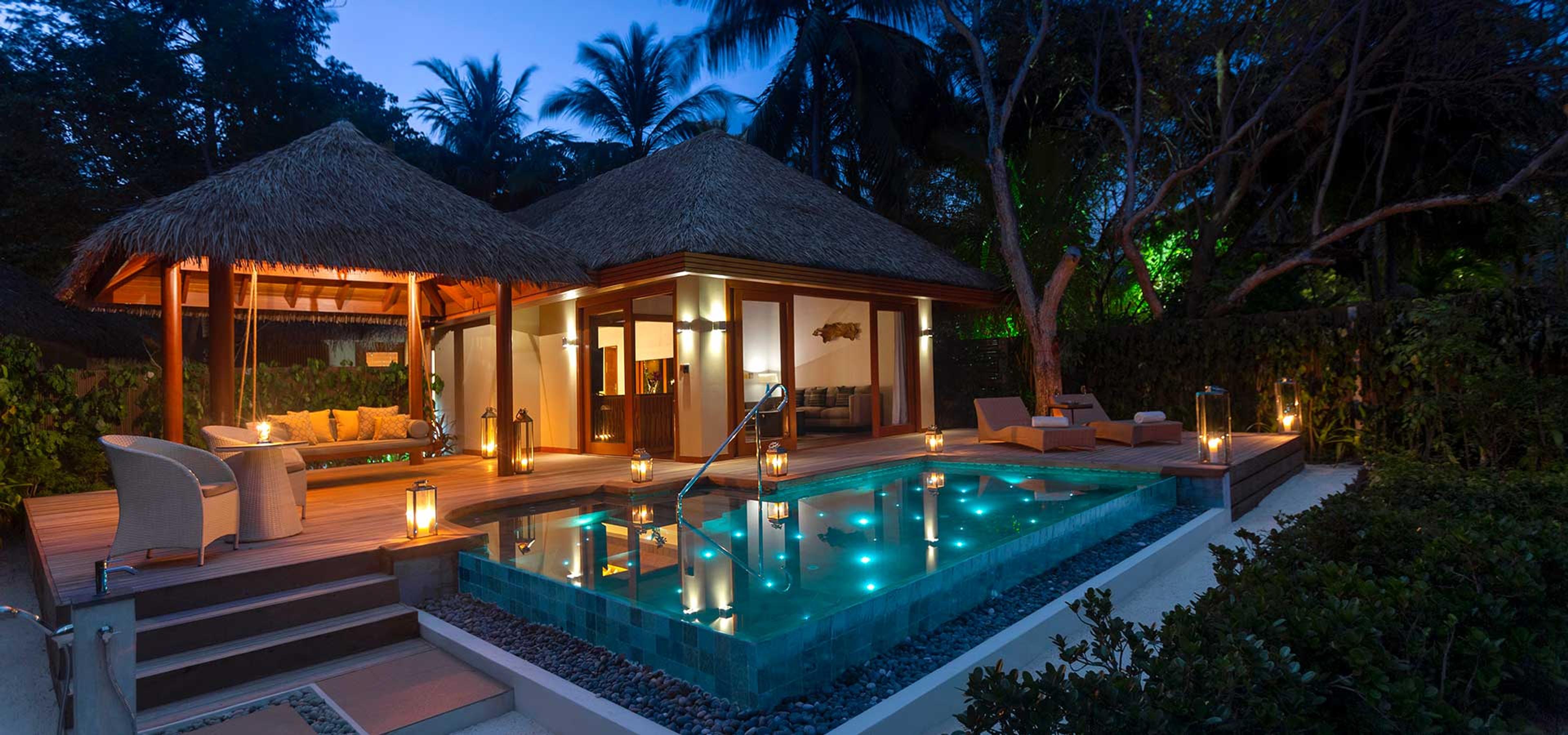Pool villa at dusk, Baros Maldives