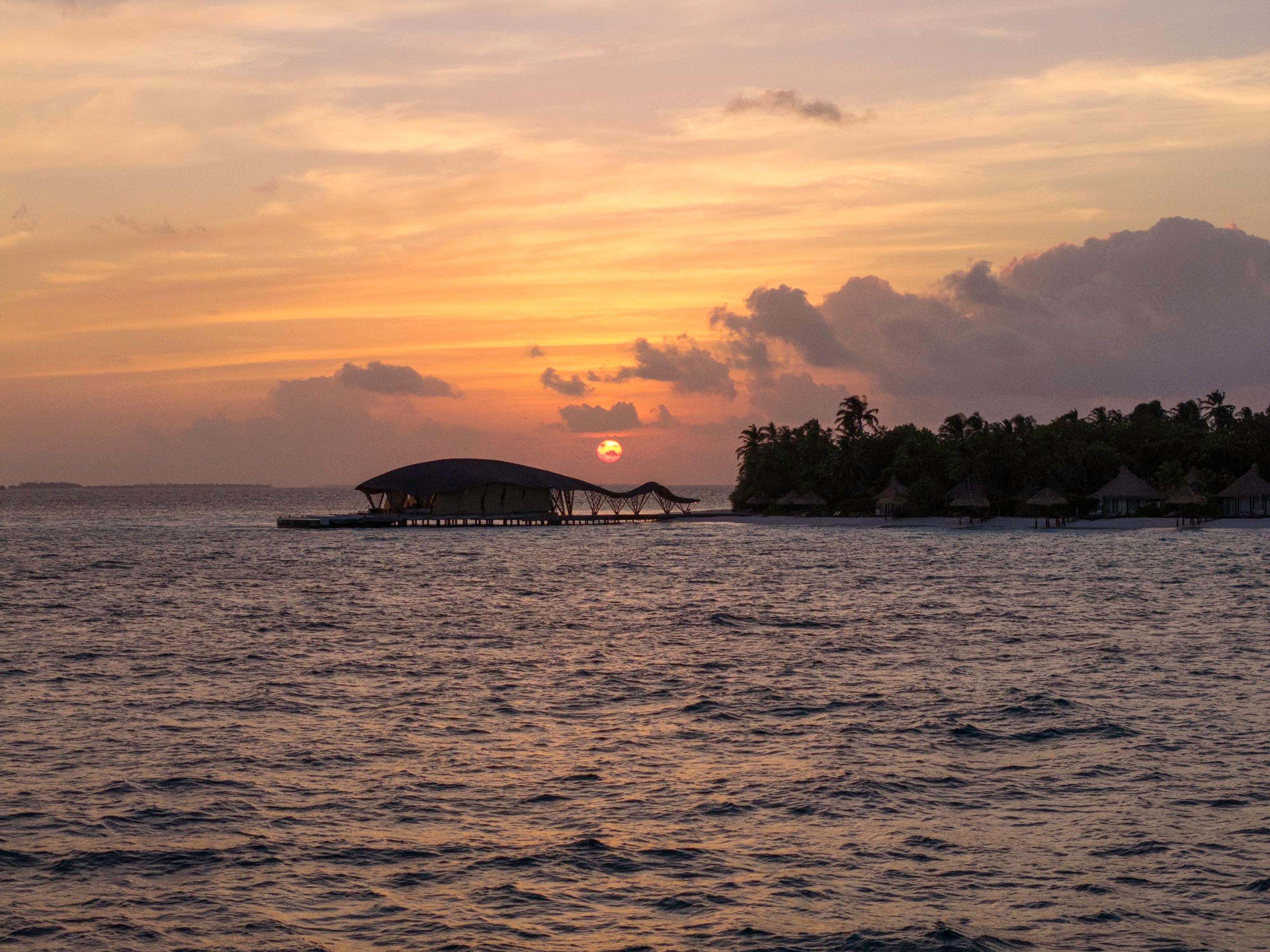 Sunset over the lagoon at Banyan Tree Vabbinfaru