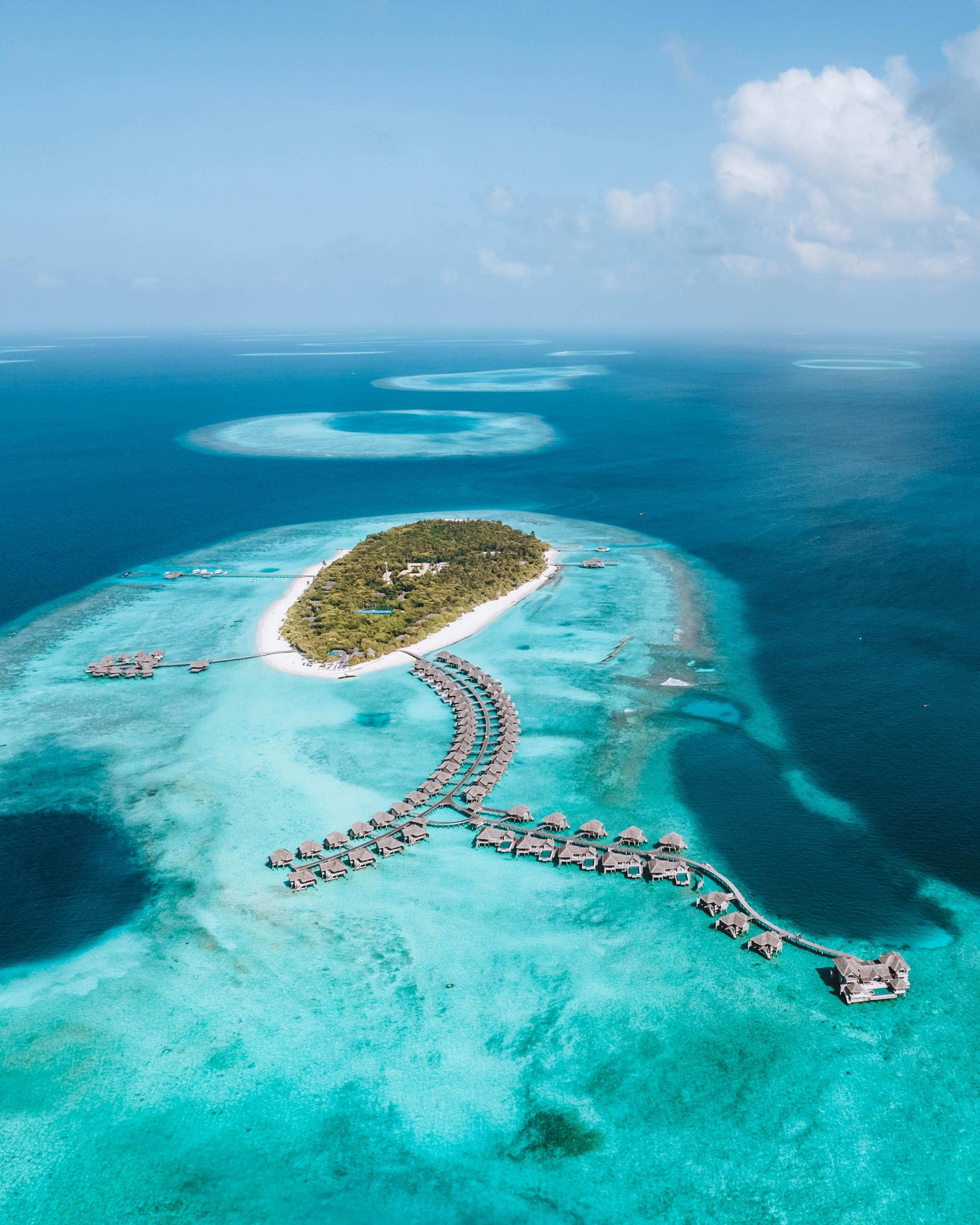Vakkaru island and its house reef from the air