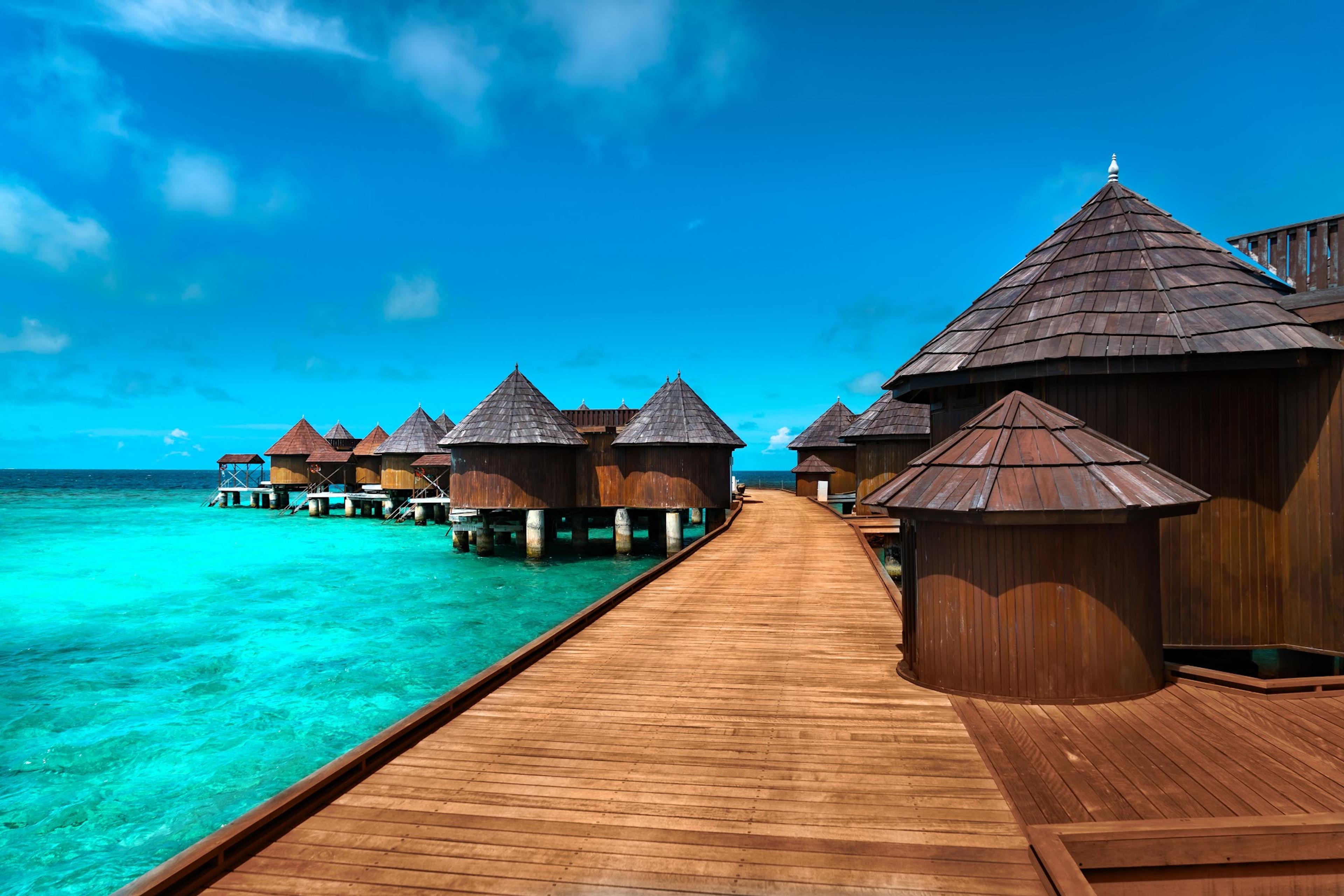 Water villas over the lagoon at Nika Island
