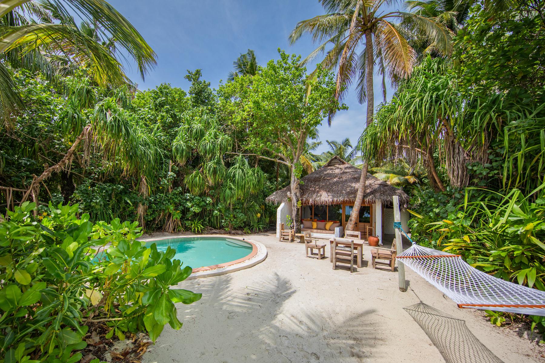 Family villa suite with pool at Soneva Fushi