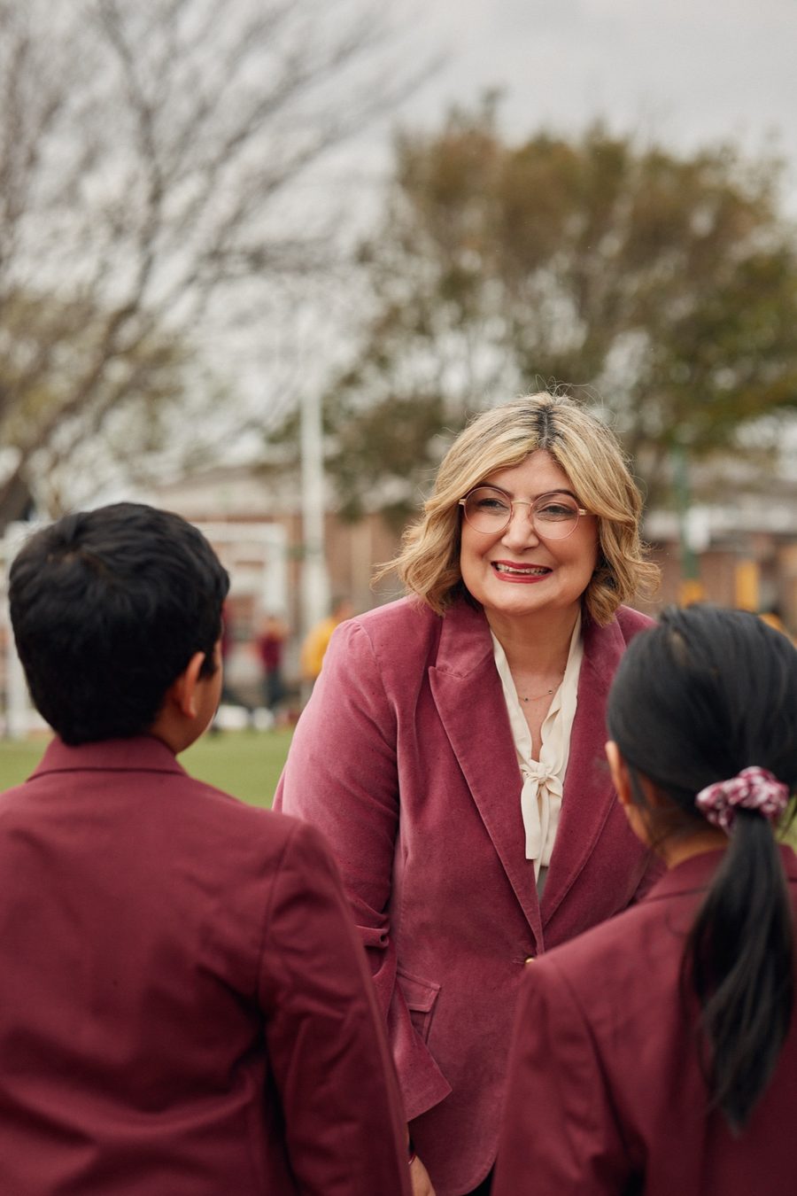 Natalie with students at a local school