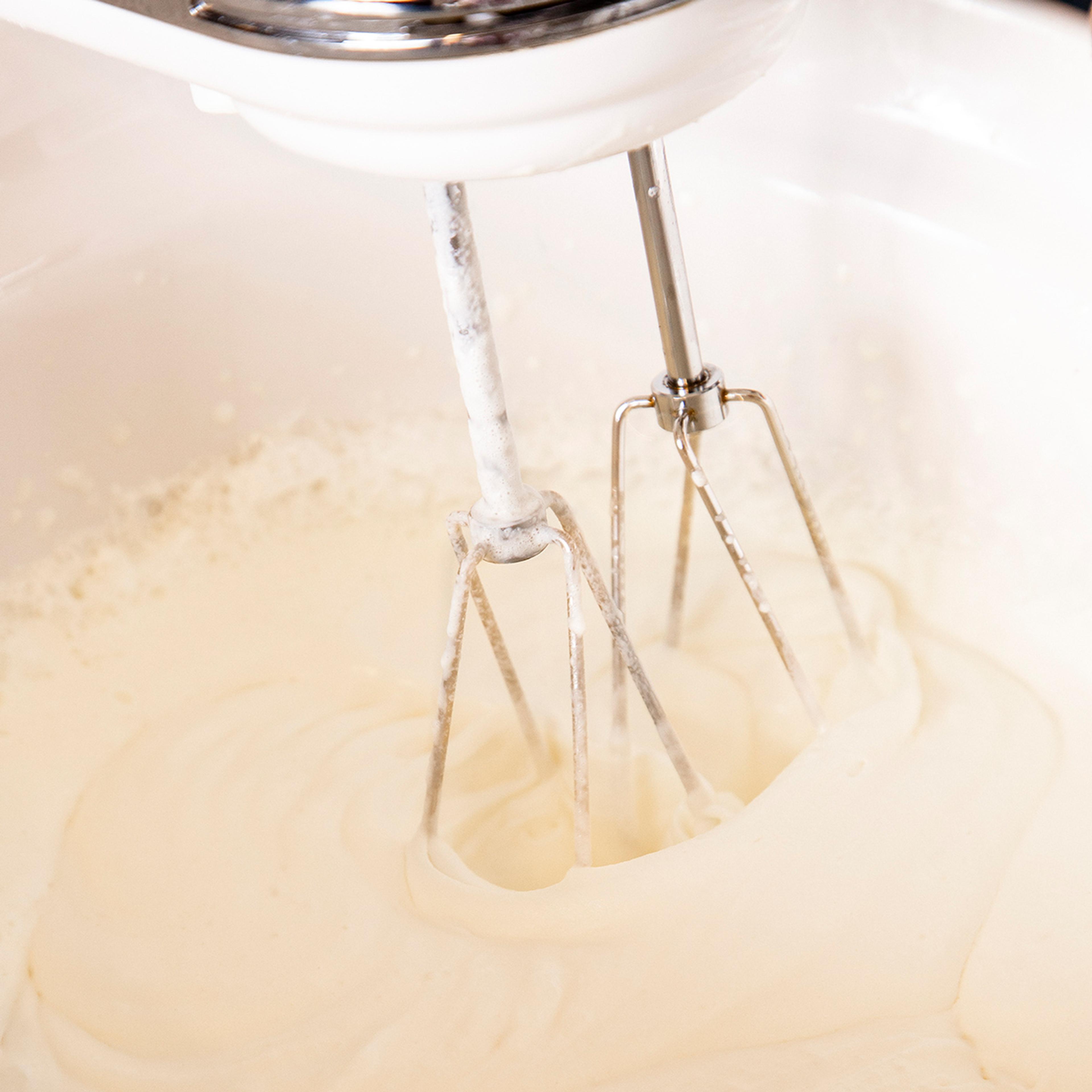 Hand beater whips heavy cream to make homemade whipped cream. Photo by Jackie Stofsick.
