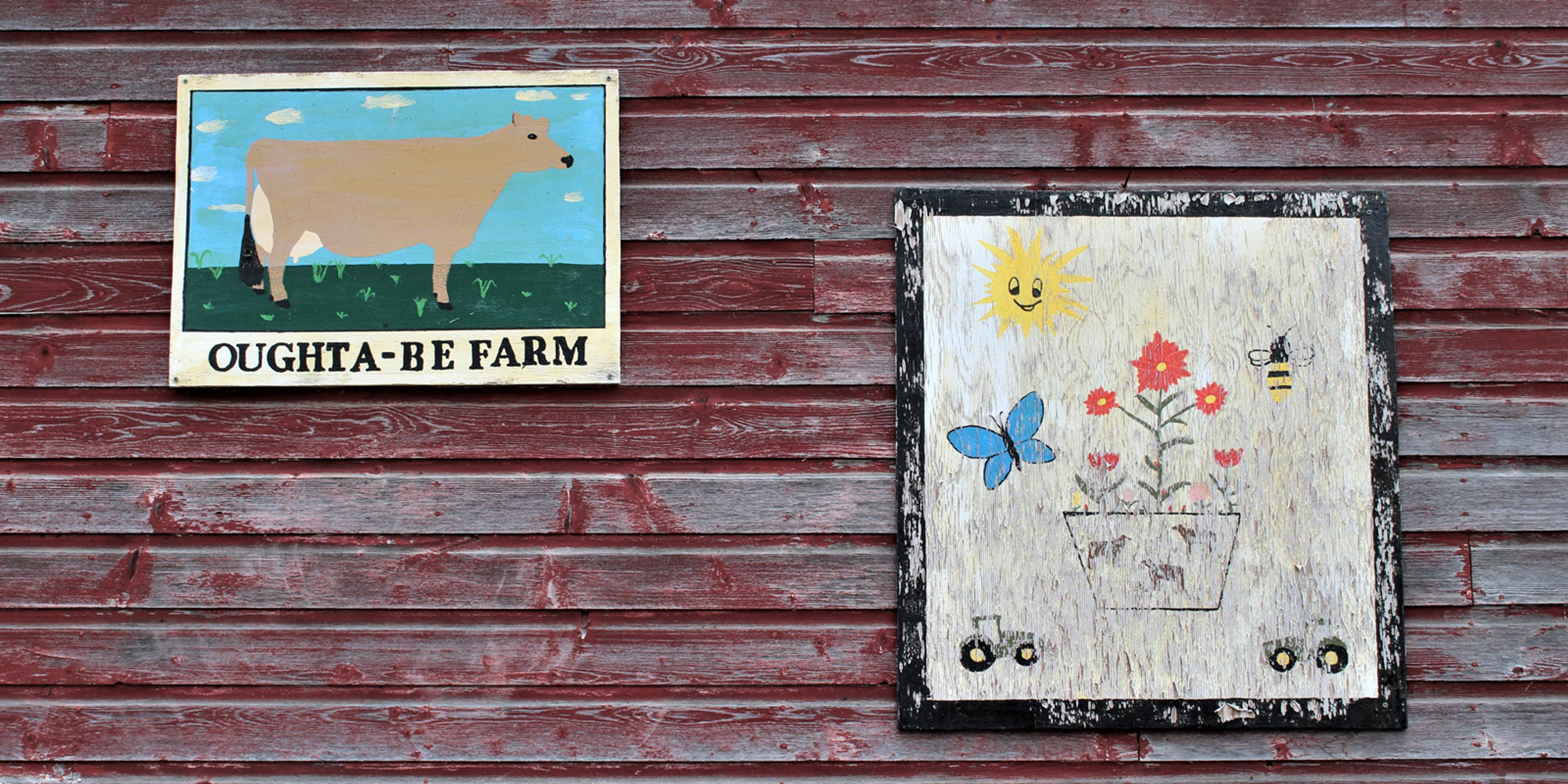 The Oughta-Be Farm sign on a barn.