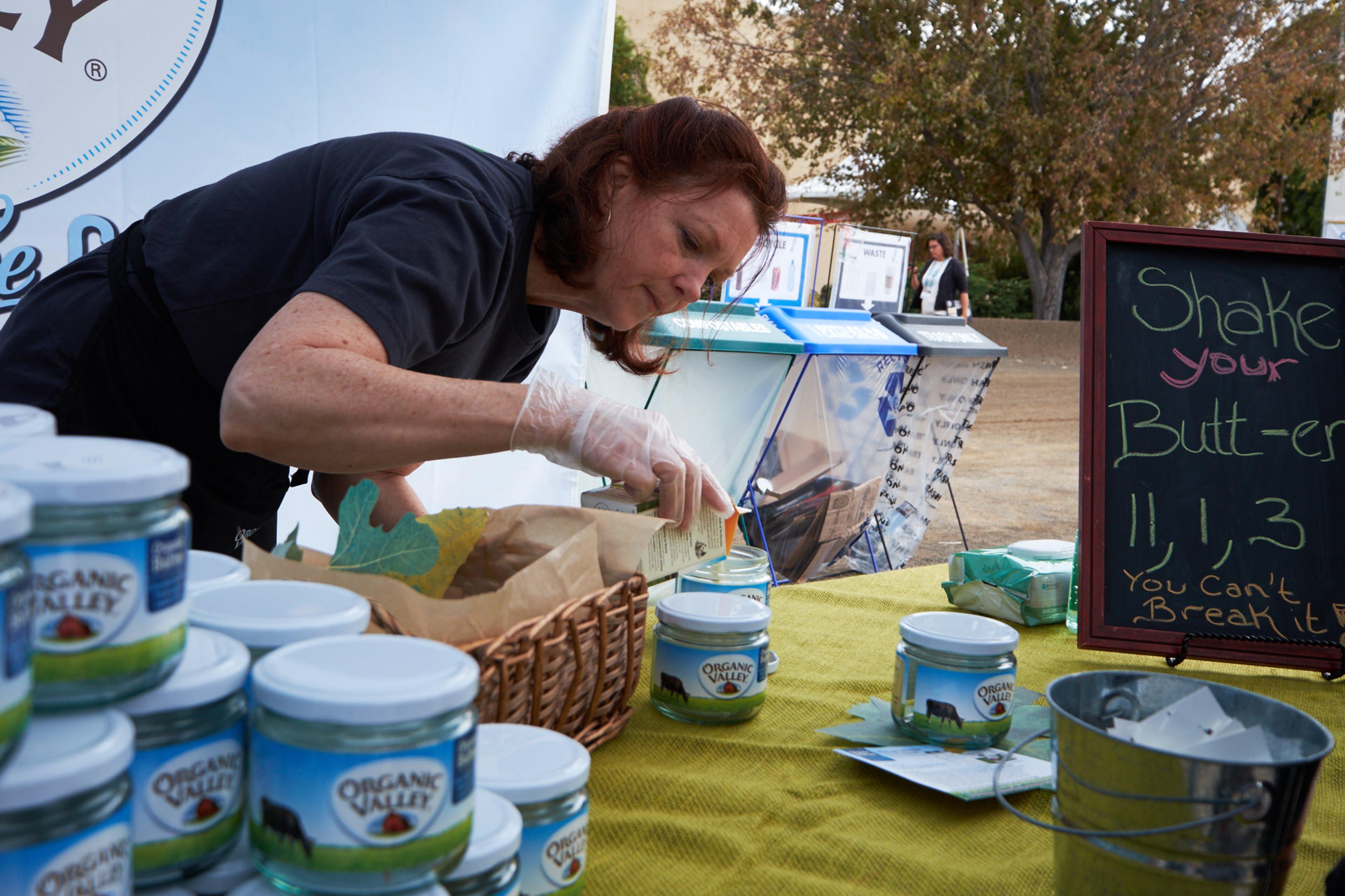 Measuring out Organic Valley cream into jars for kids to shake up.