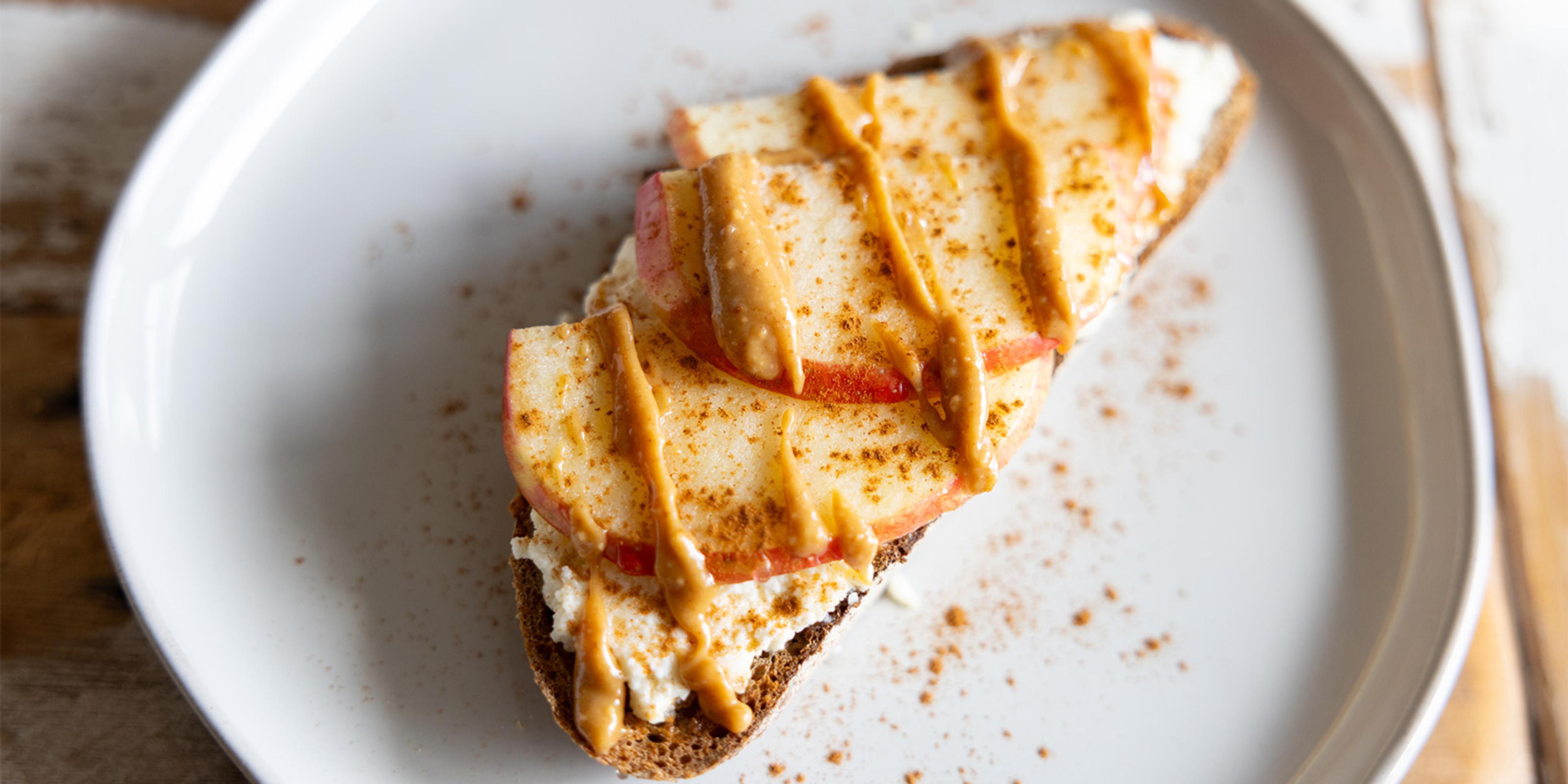 Organic Valley® Ricotta Cheese on sourdough toast with apples, cinnamon, honey and peanut butter