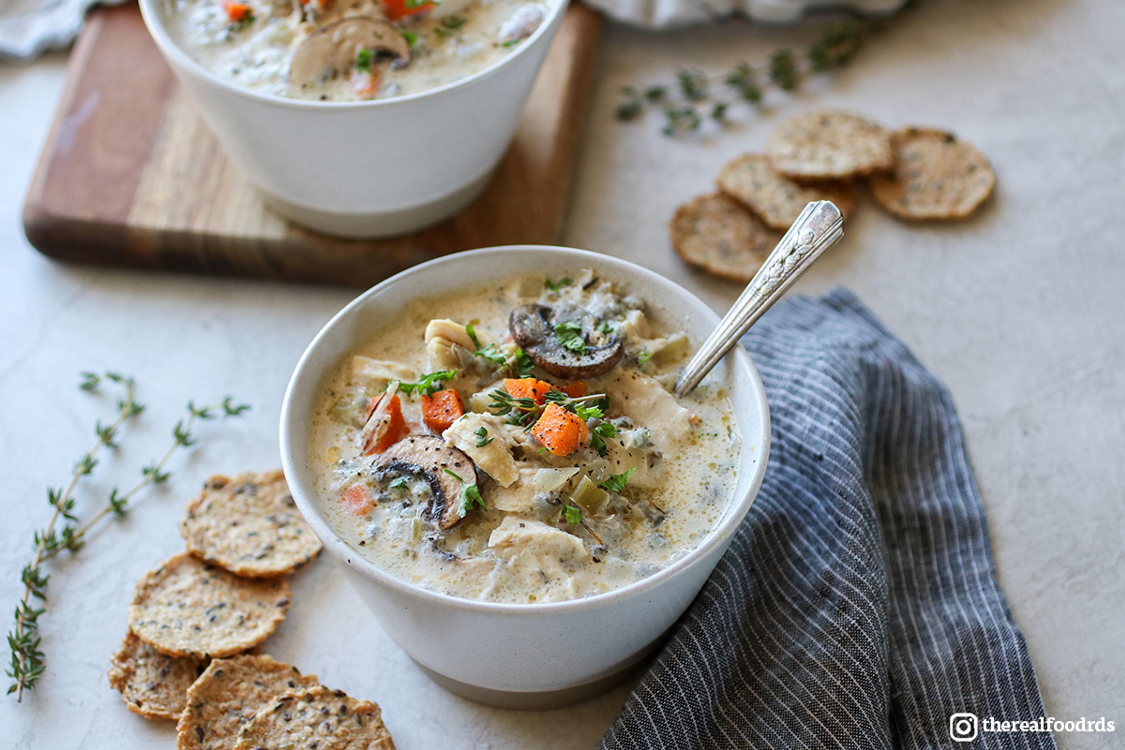 Two bowls of Slow Cooker Chicken Wild Rice Soup.
