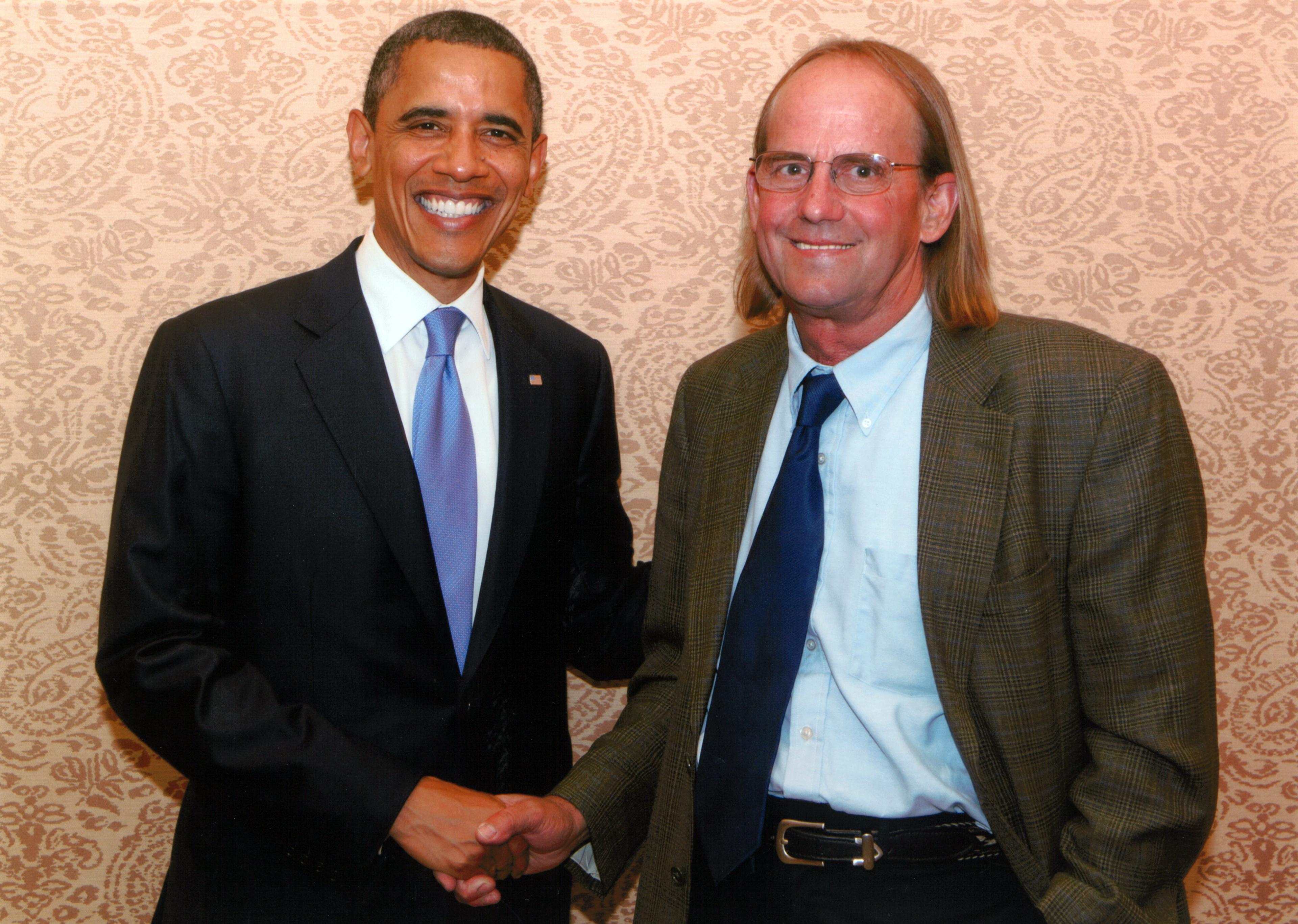 George Siemon shakes hands with former President Barack Obama in Washington, D.C. 