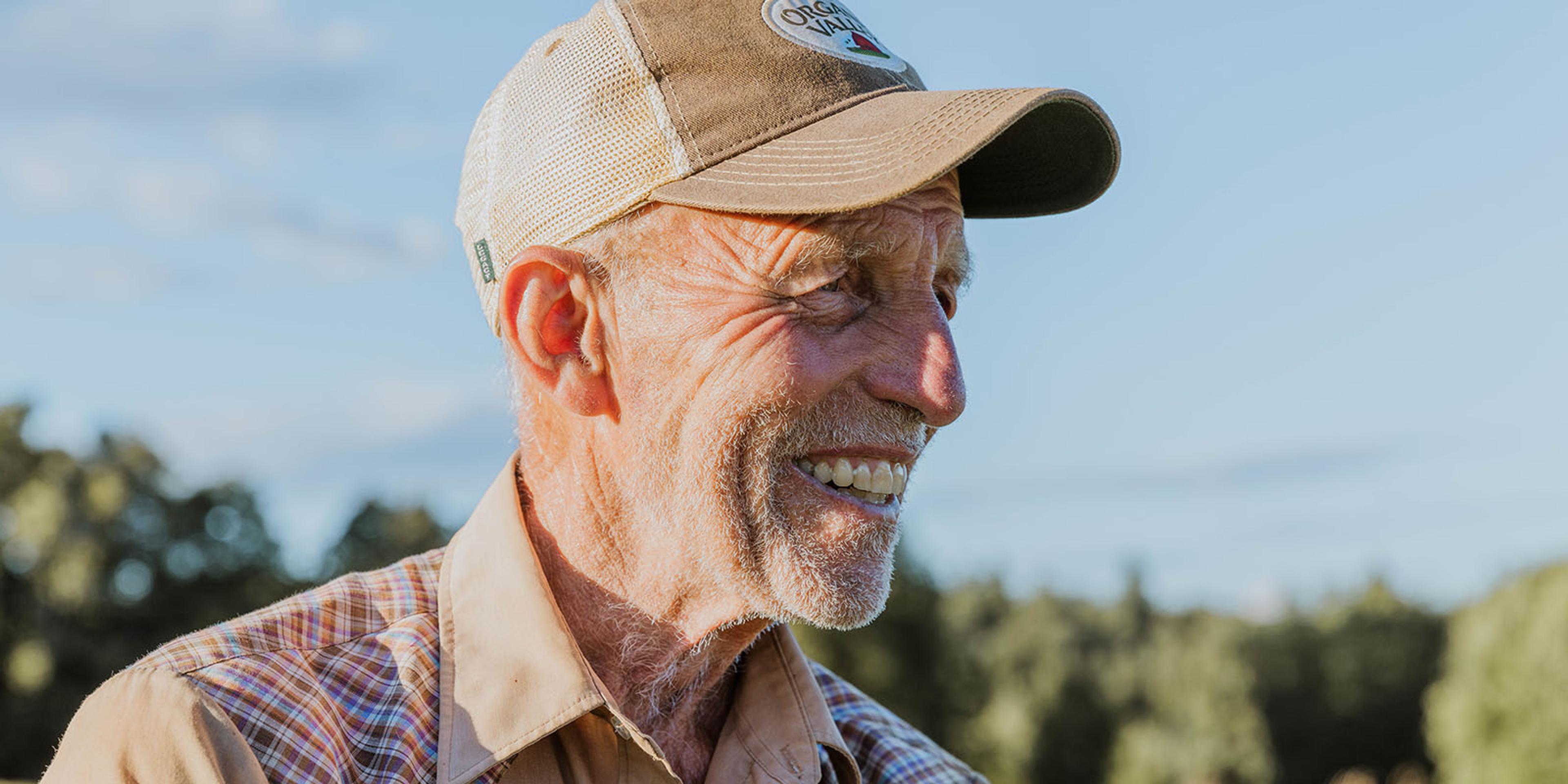 A Vermont farmer smiles.