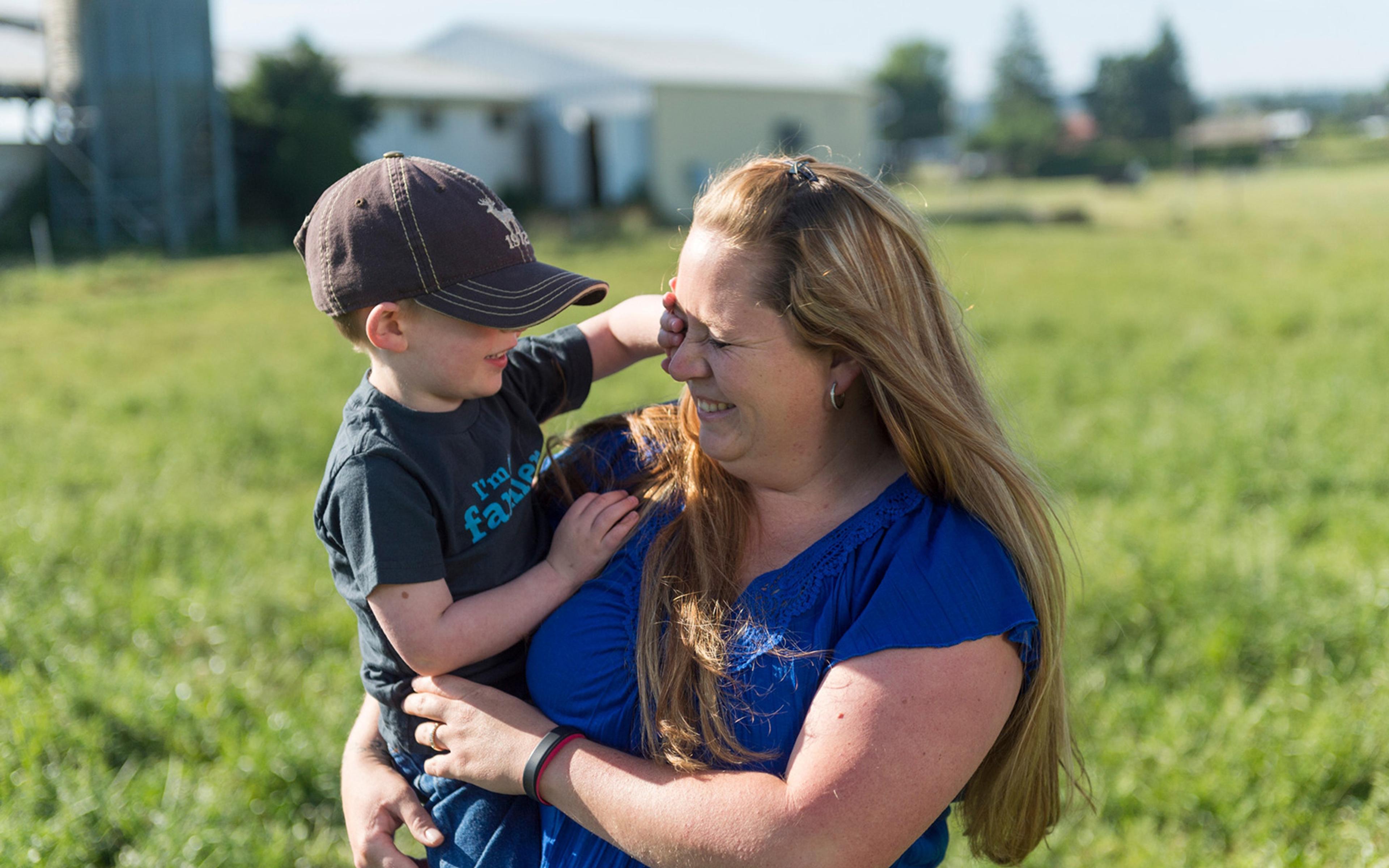 Melissa Collman laughs with her son.