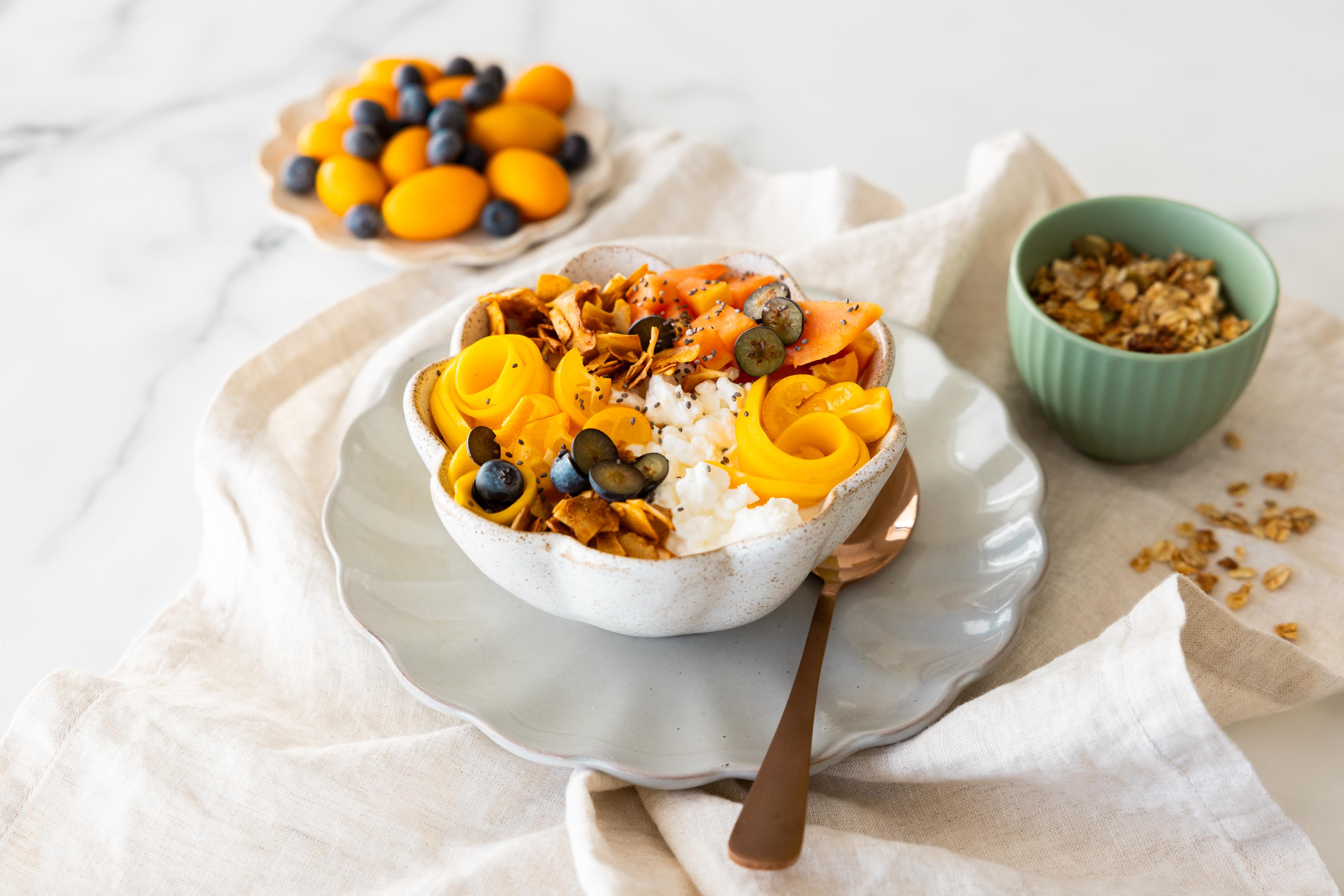 Organic cottage cheese with fruit in a bowl. 