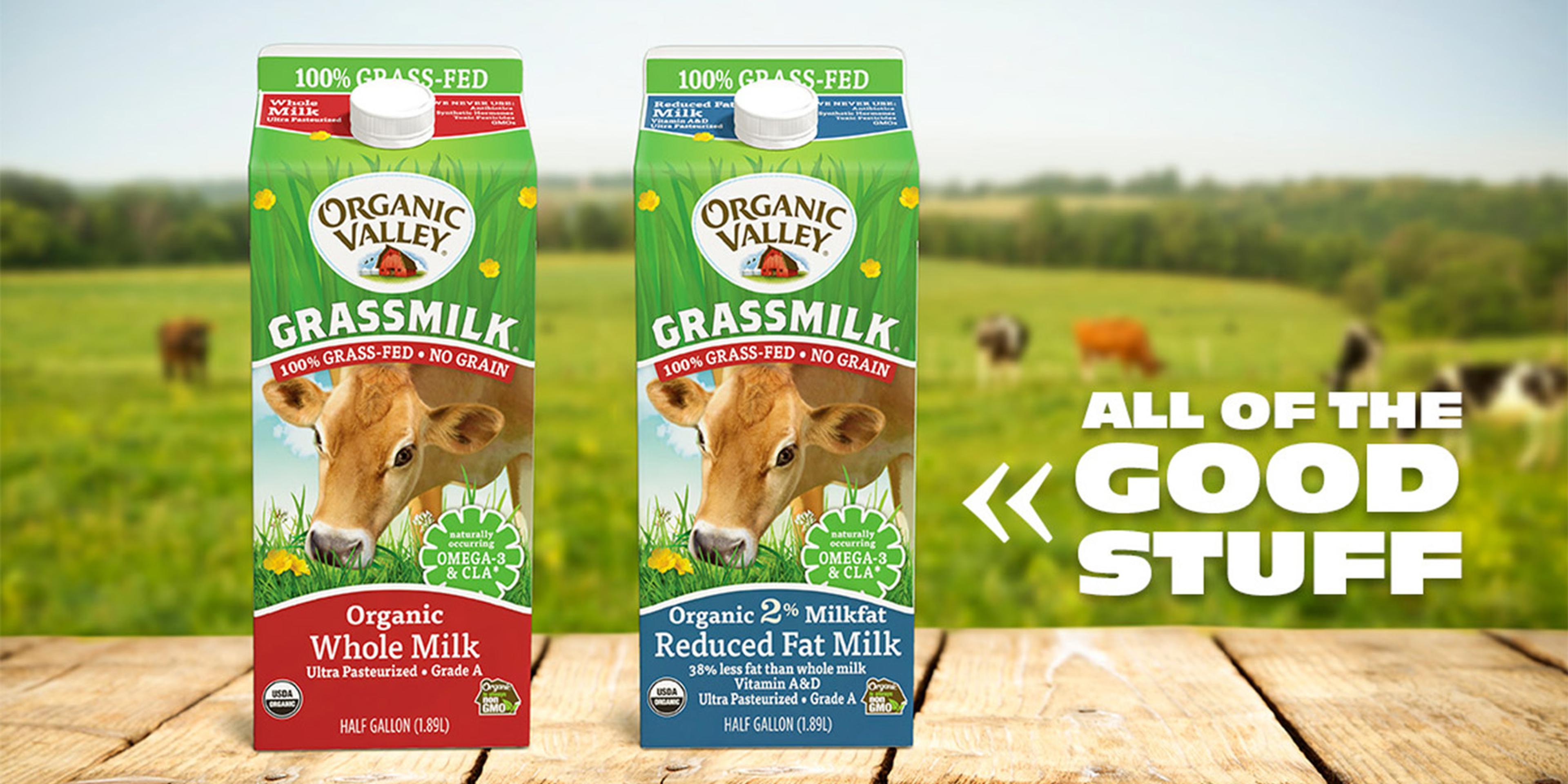Two cartons of Organic Valley Grassmilk? shown with cows on pasture in the background.