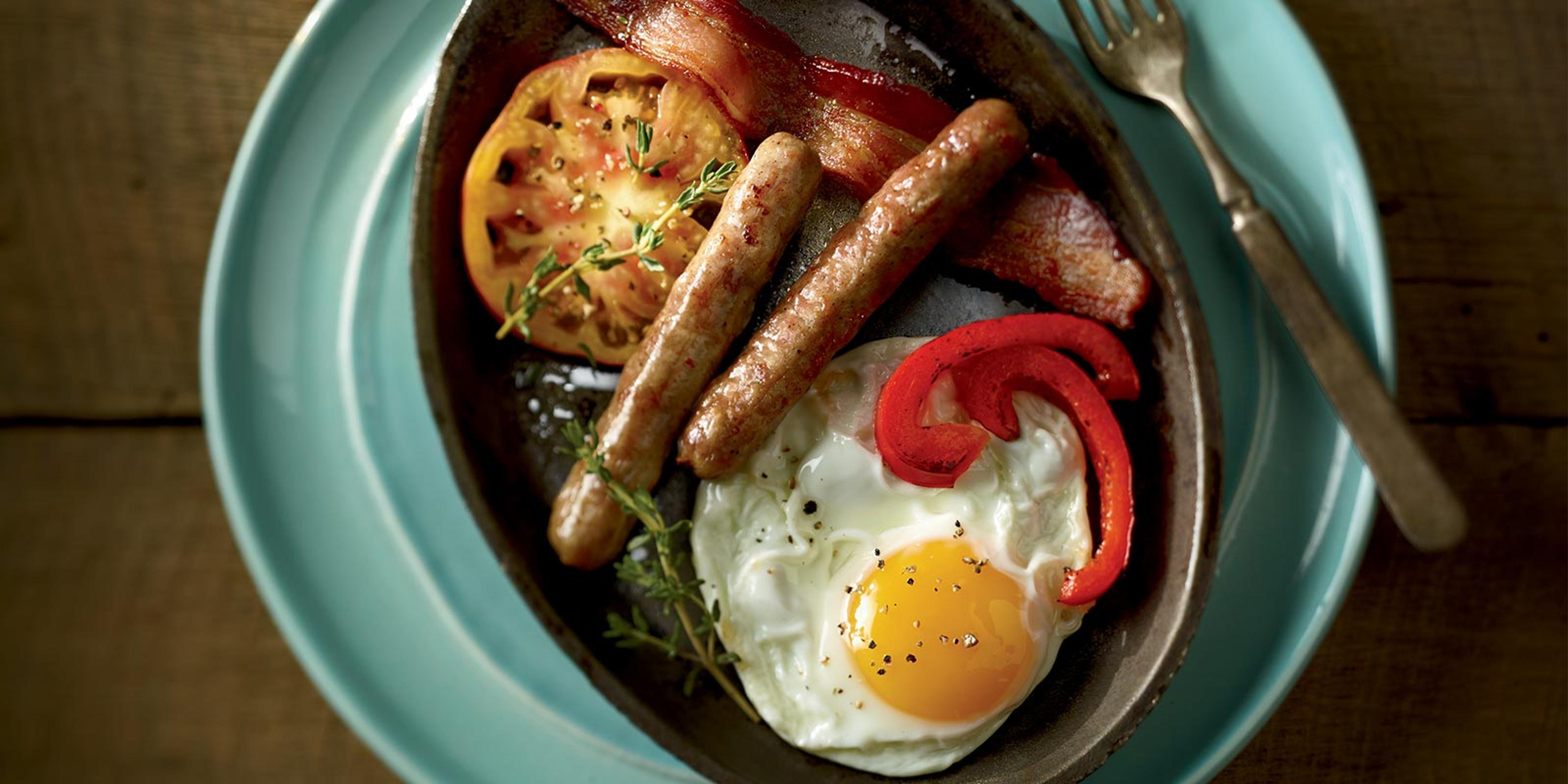 Organic Valley® Eggs and Bacon with Organic Prairie® Sausage in a skillet.