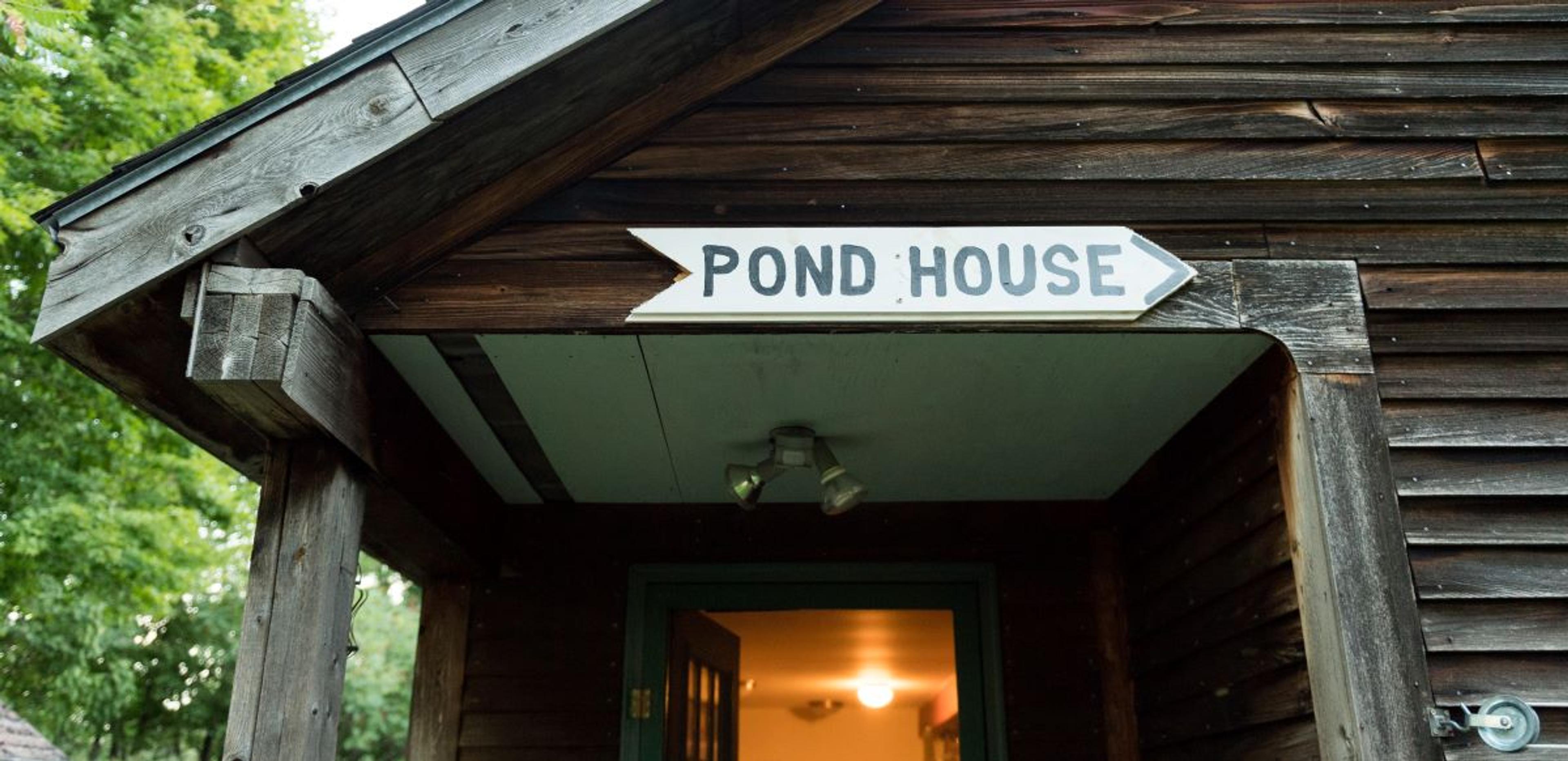 A sign reading “Pond House” on a cabin at the Webb organic dairy farm in Vermont.