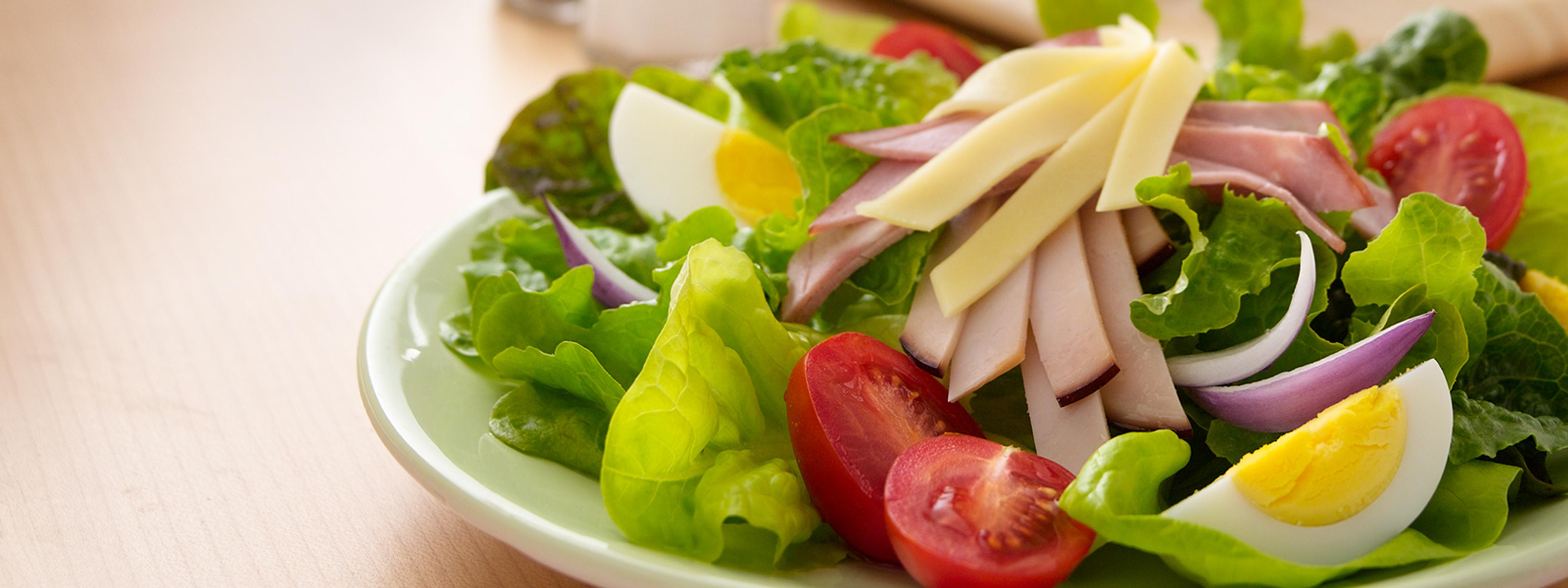 A chef salad featuring organic ingredients.