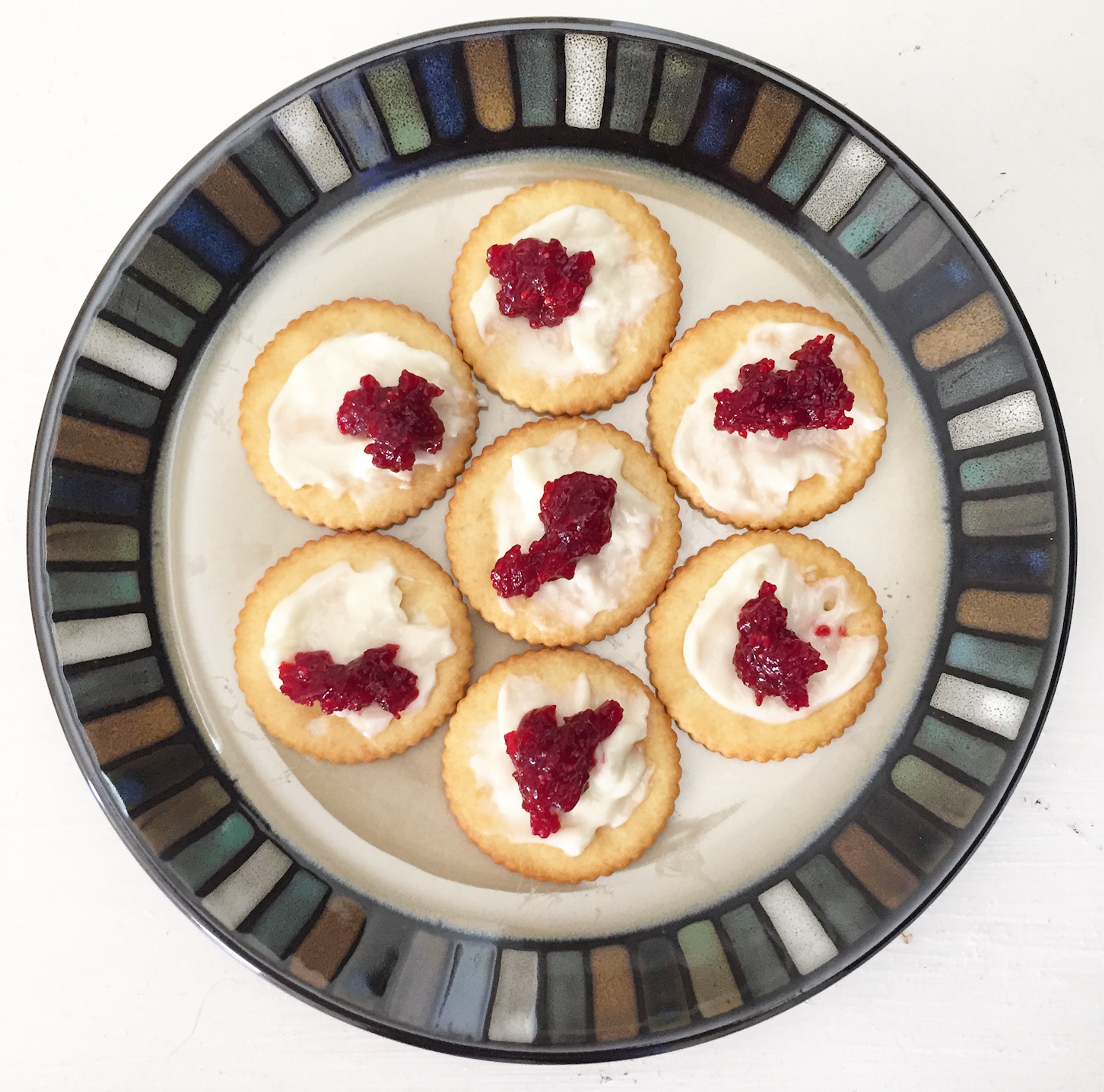 Open-faced cracker sandwiches with cream cheese, strawberries, and cinnamon powder. Photo contributed by Chandni Patel of Chand’s Kitchen.