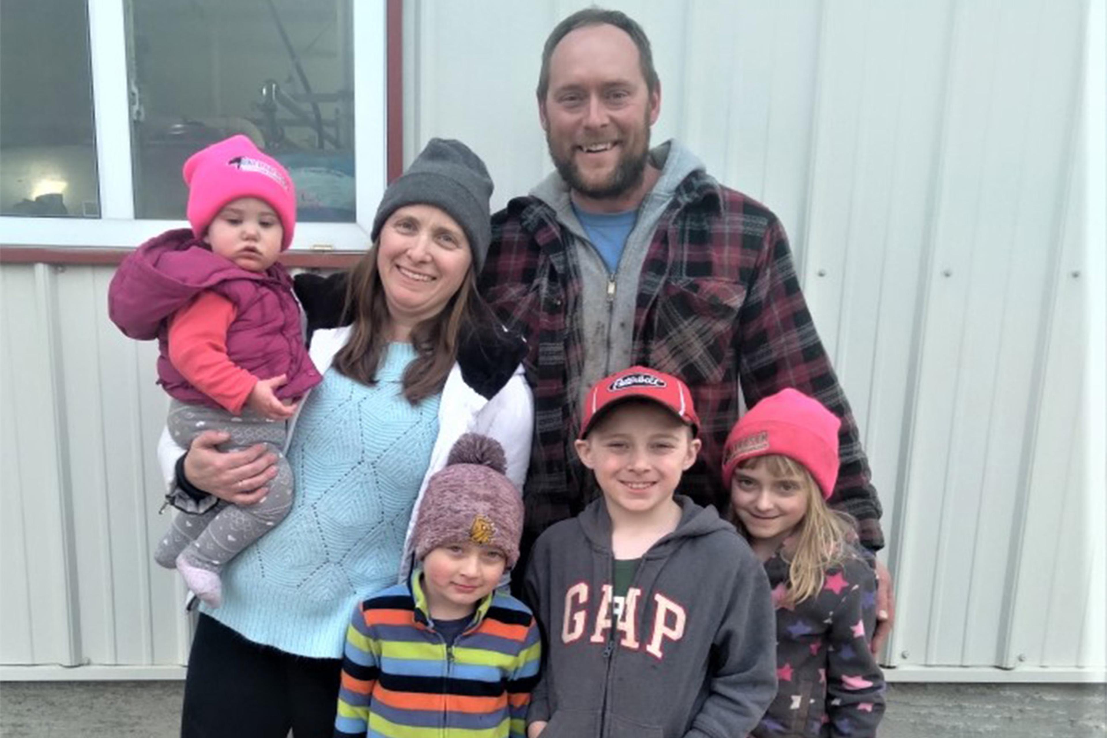 The Winnes family poses for a photo.