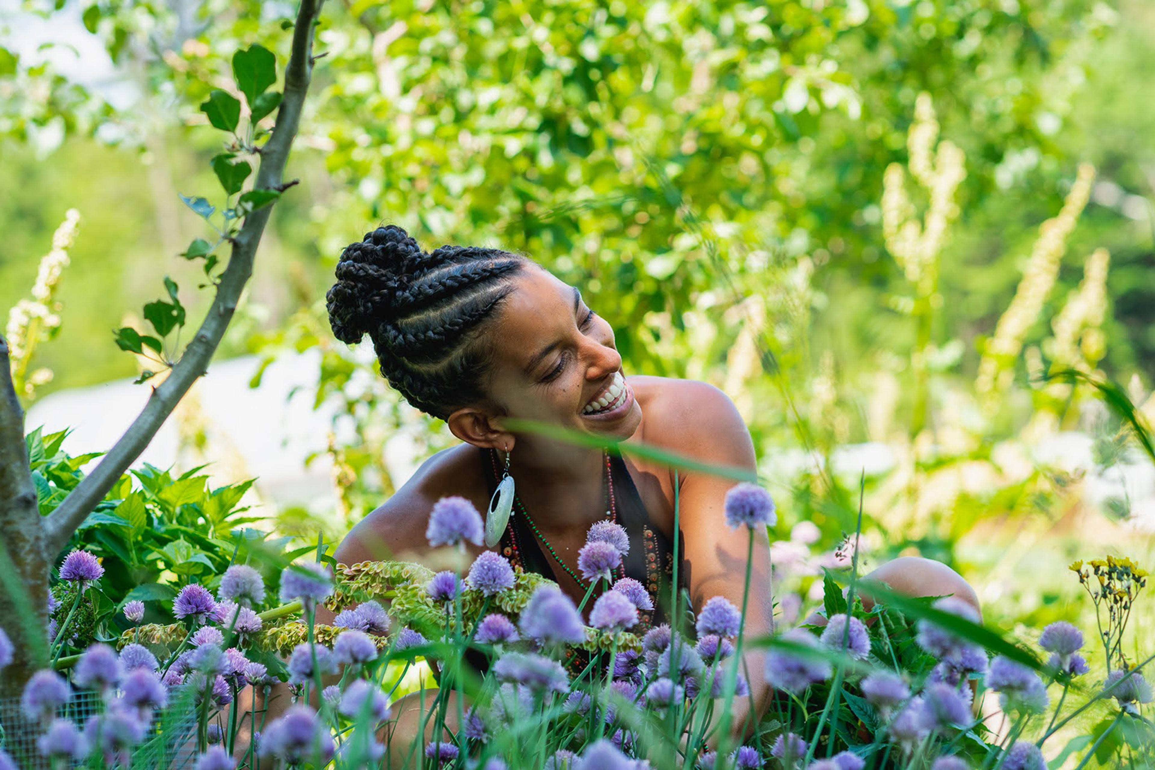 Food justice activist, Leah Penniman in a field.