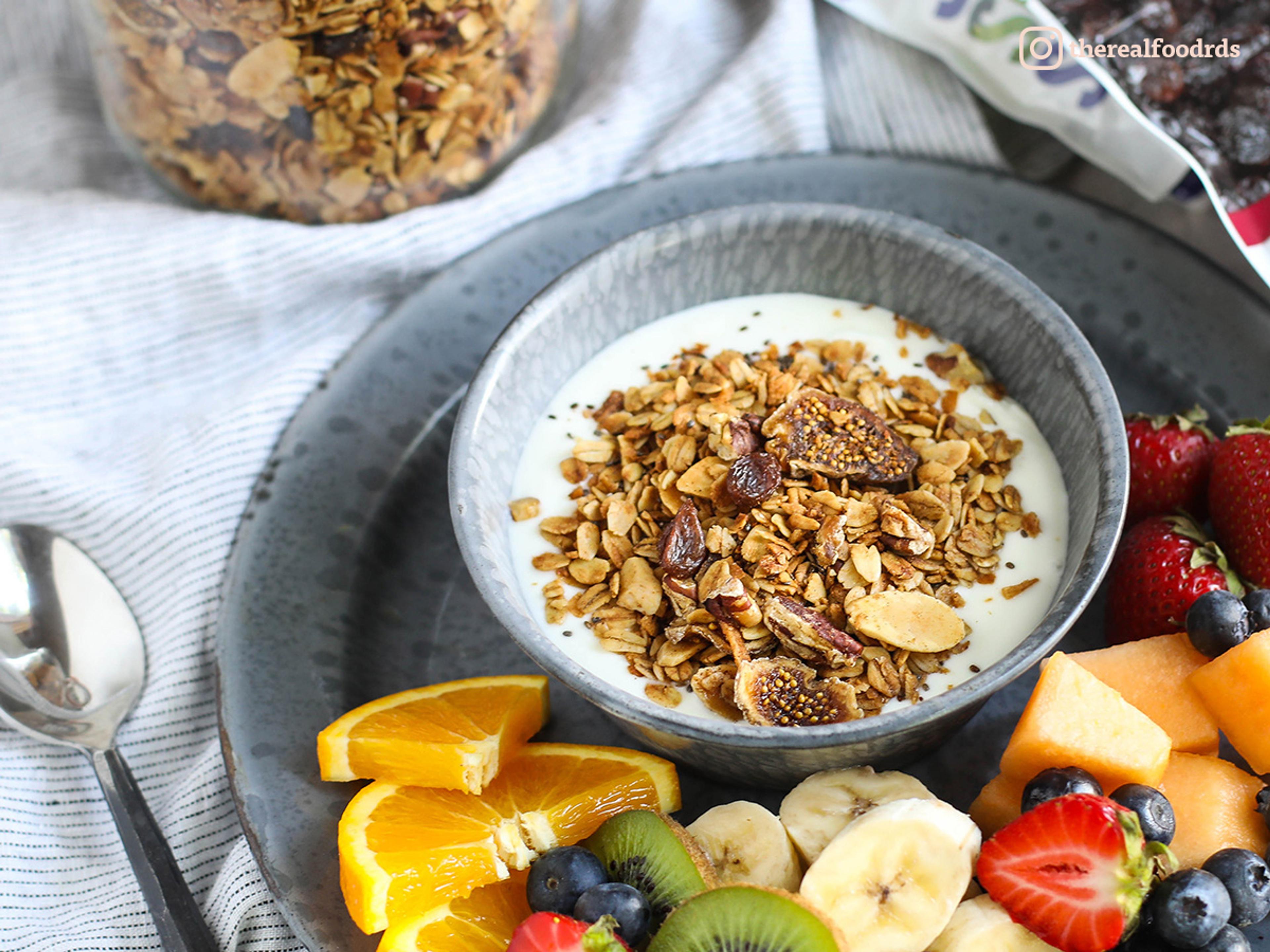 Homemade granola and grass-fed yogurt with fresh fruit on the side. Photo by Real Food Dietitians.