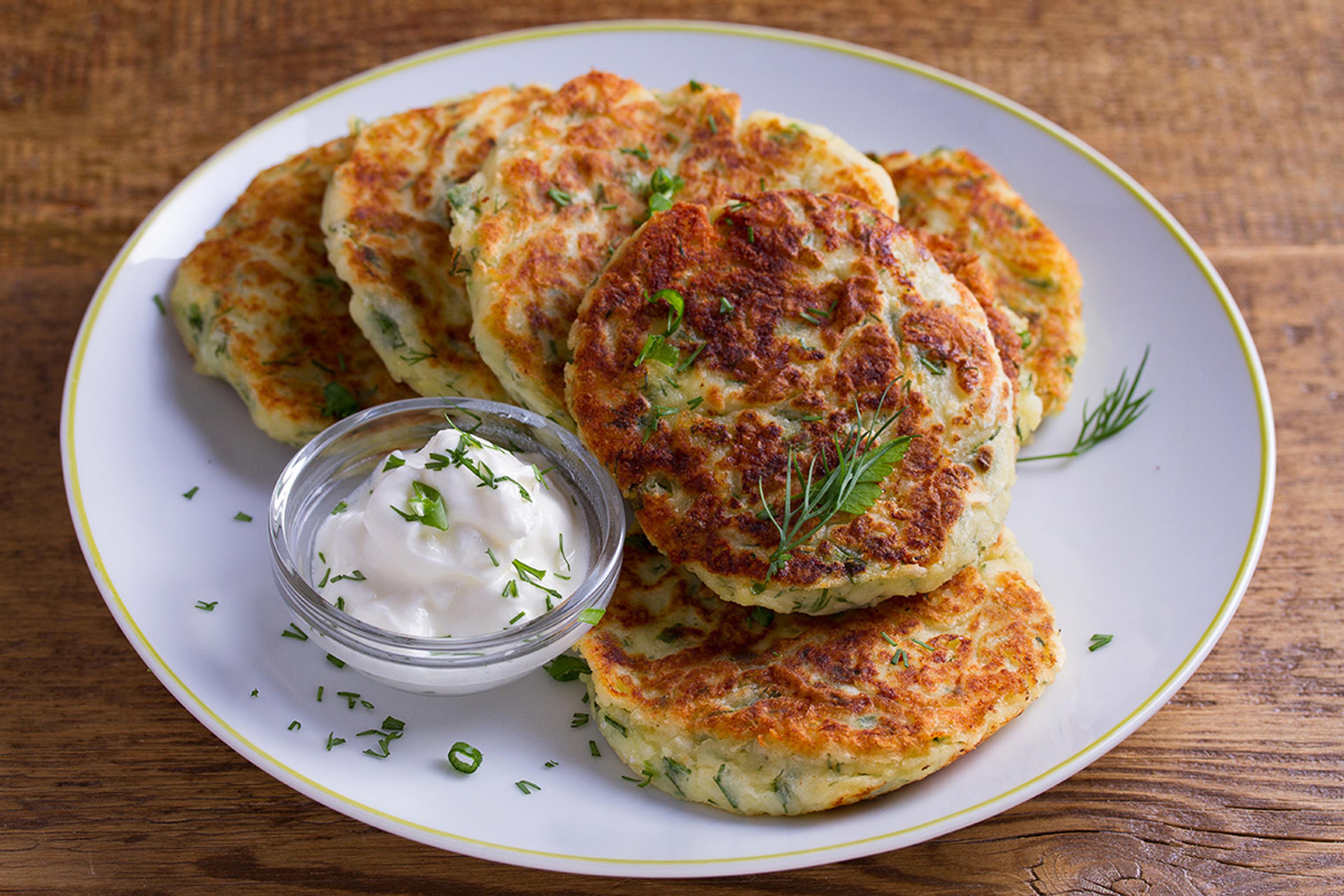 A plate of potatoe pancakes, using leftover mashed potatoes from Thanksgiving dinner.