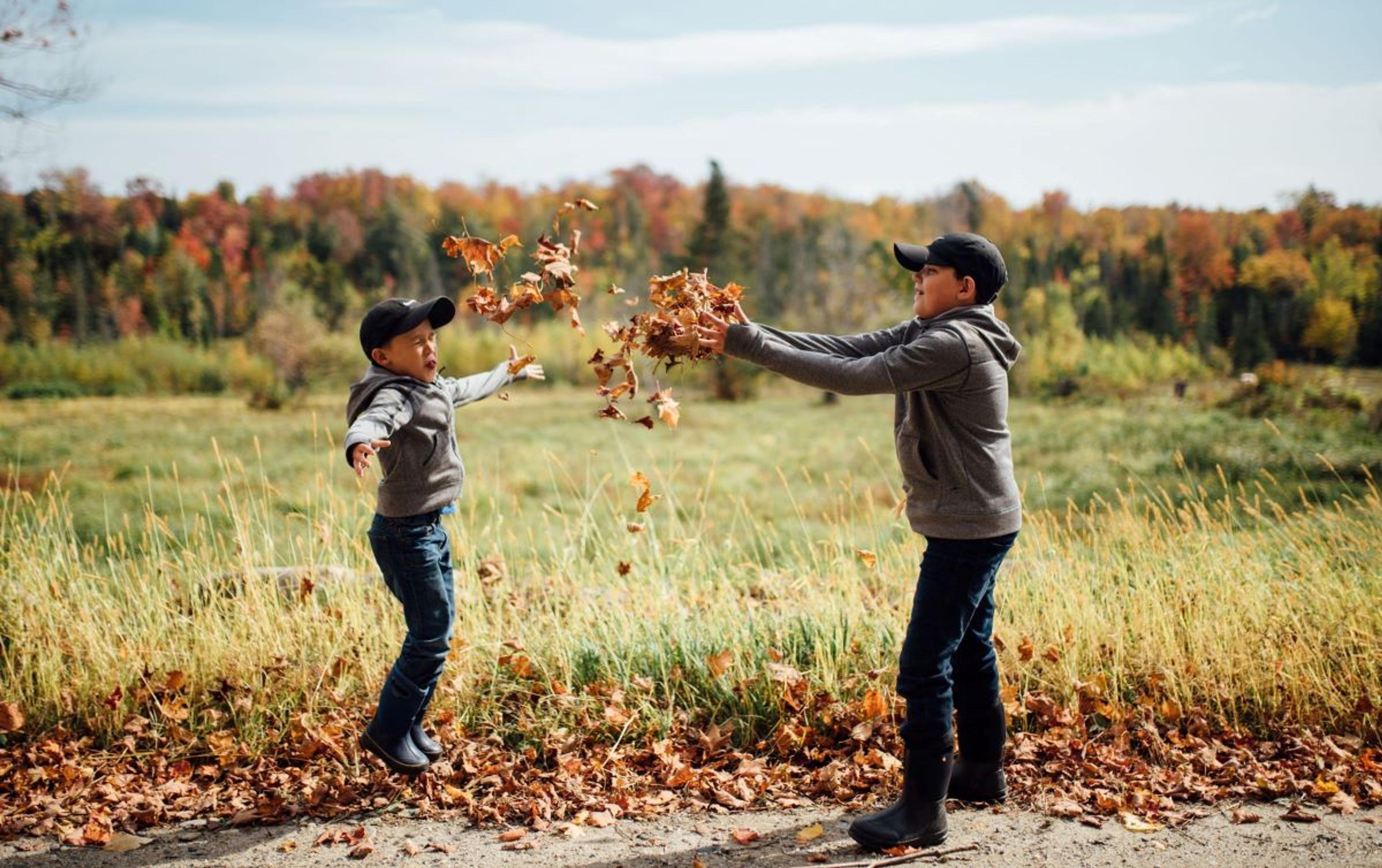 The Corse boys throw leaves.