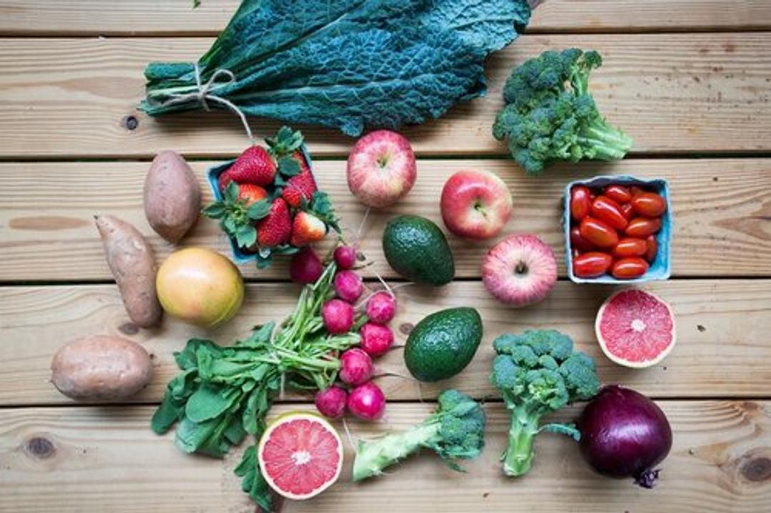 Photo from above showing a wide variety of produce that is included in the Hungry Harvest shipments.