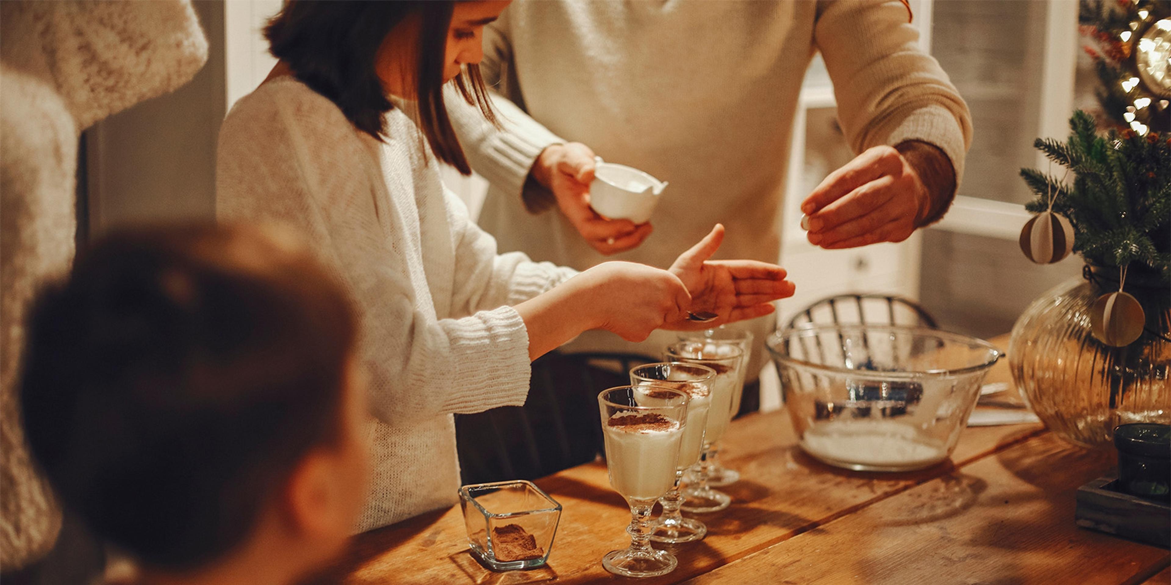 A family preps homemade eggnog.