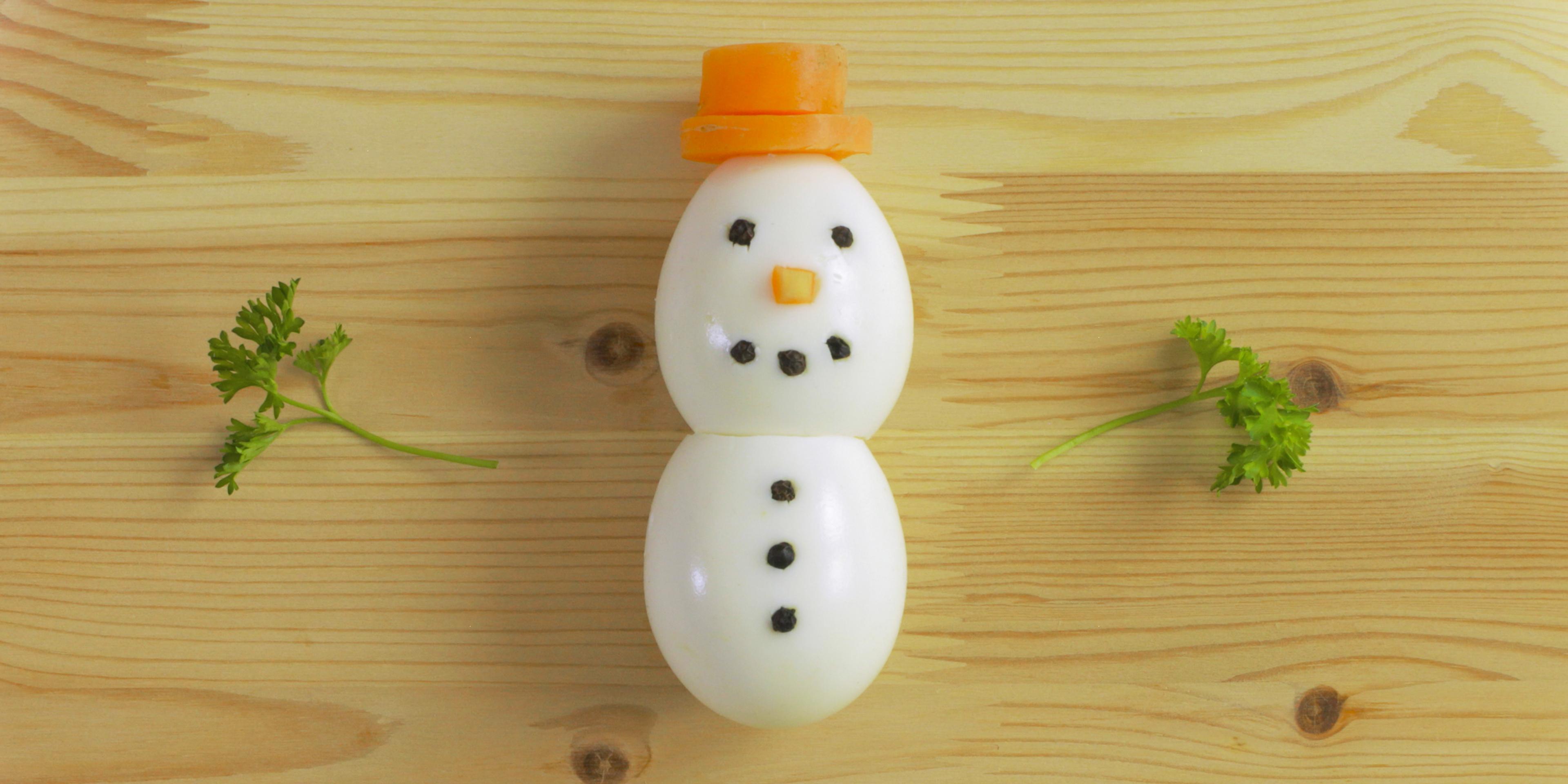 The egg snowman near completion.