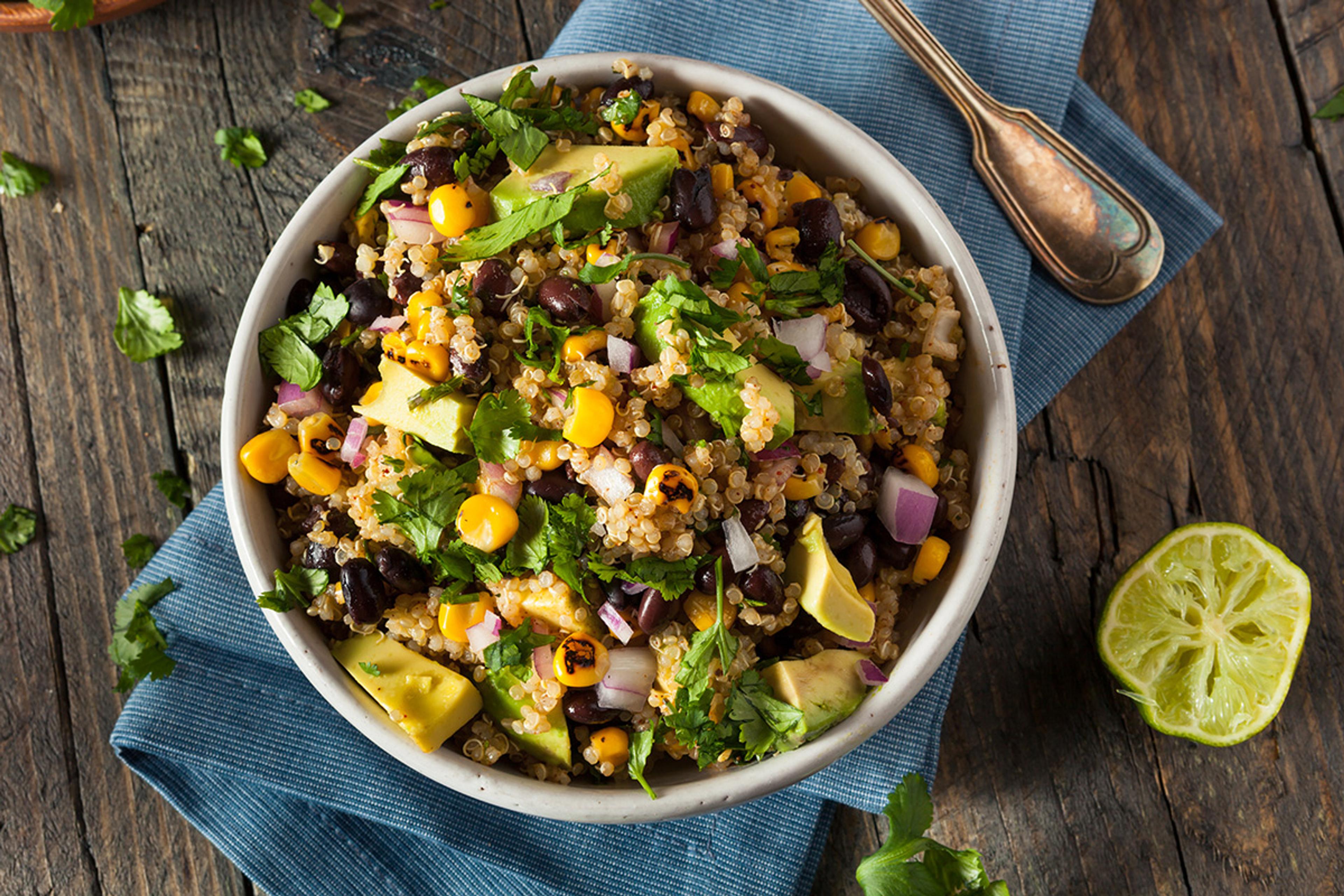 Bowl of Southwestern-style quinoa with fresh lime and cilantro. 