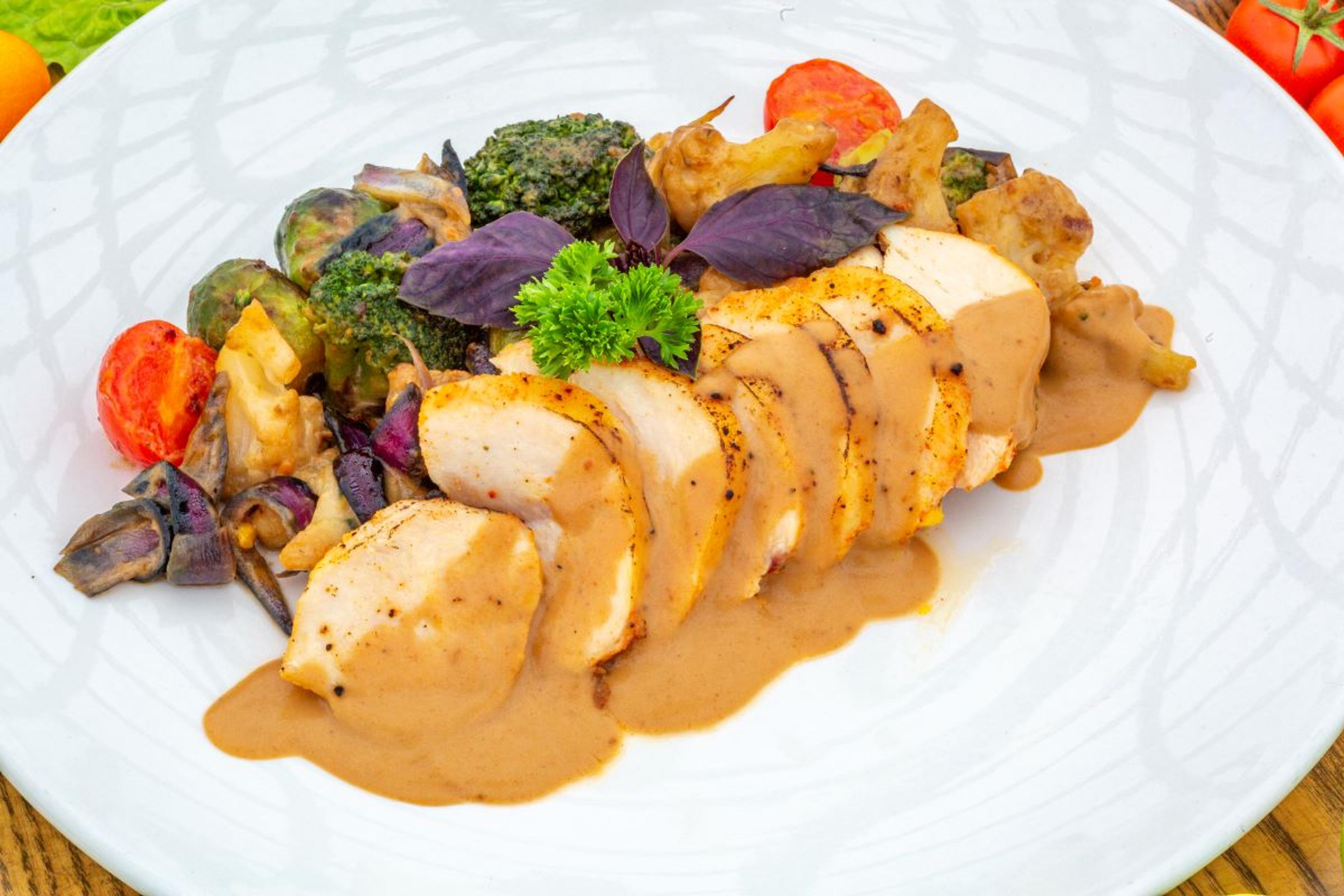 Sliced turkey with gravy.