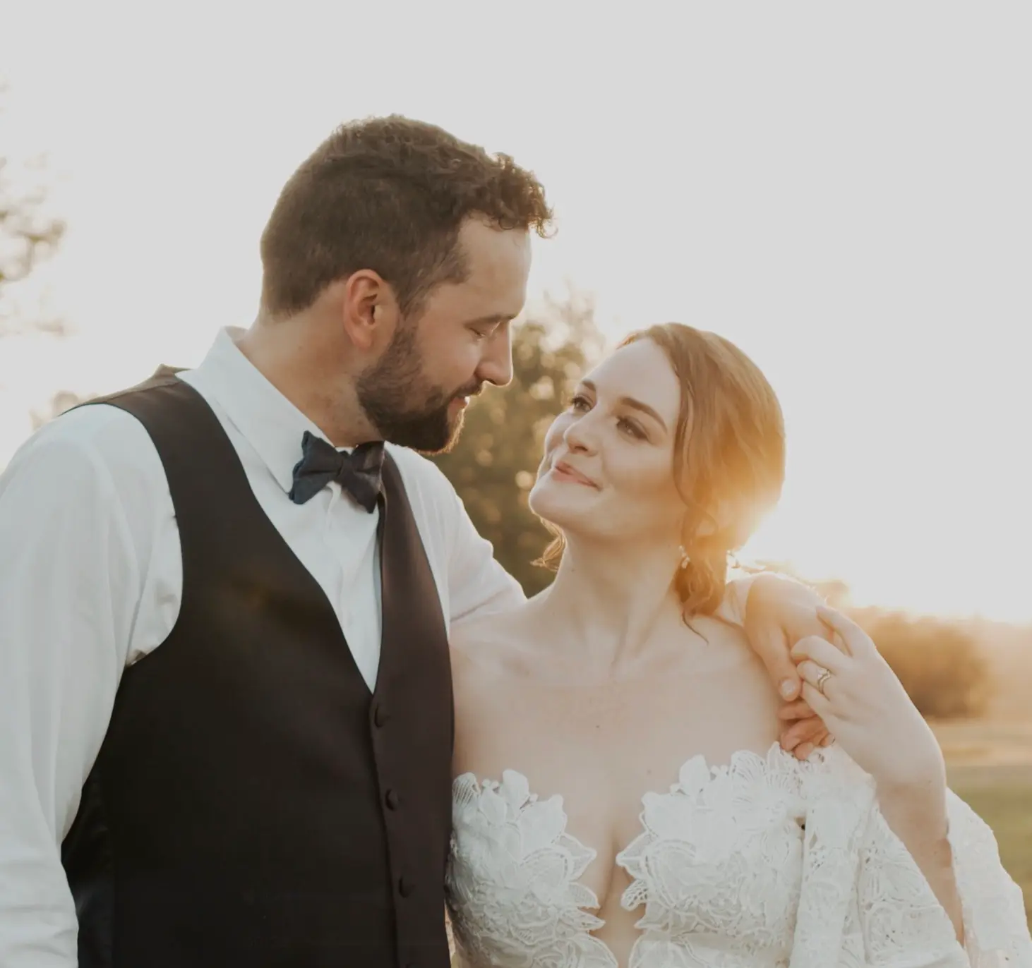 Lauren + Trevor share a romantic glance.