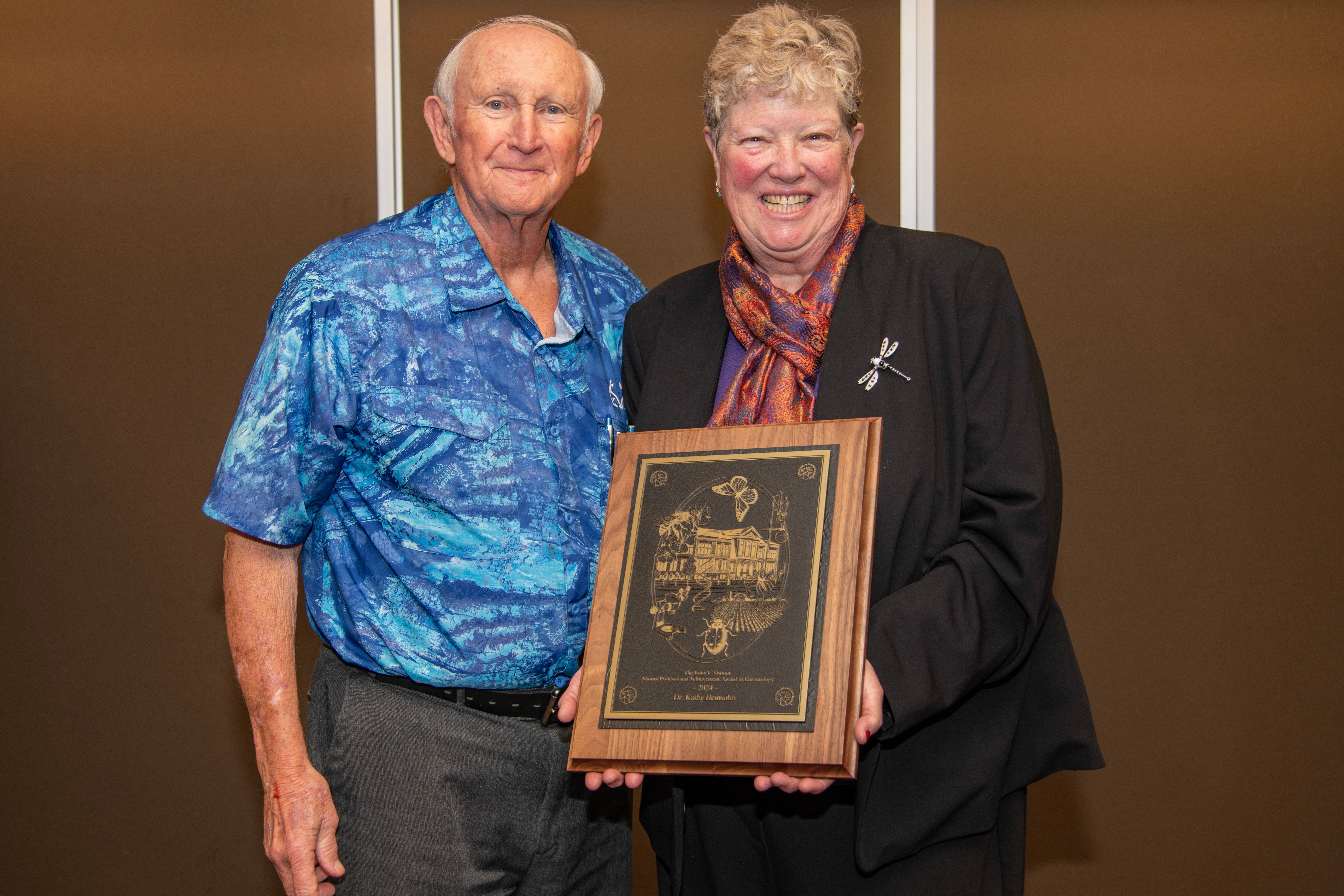 Kathy receiving the 2024 Dr. John V. Osmun Distinguished Alumni Award for the Department of Entomology at Purdue University. 
