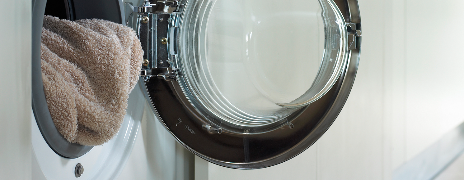 Tvättmaskin i tvättstuga