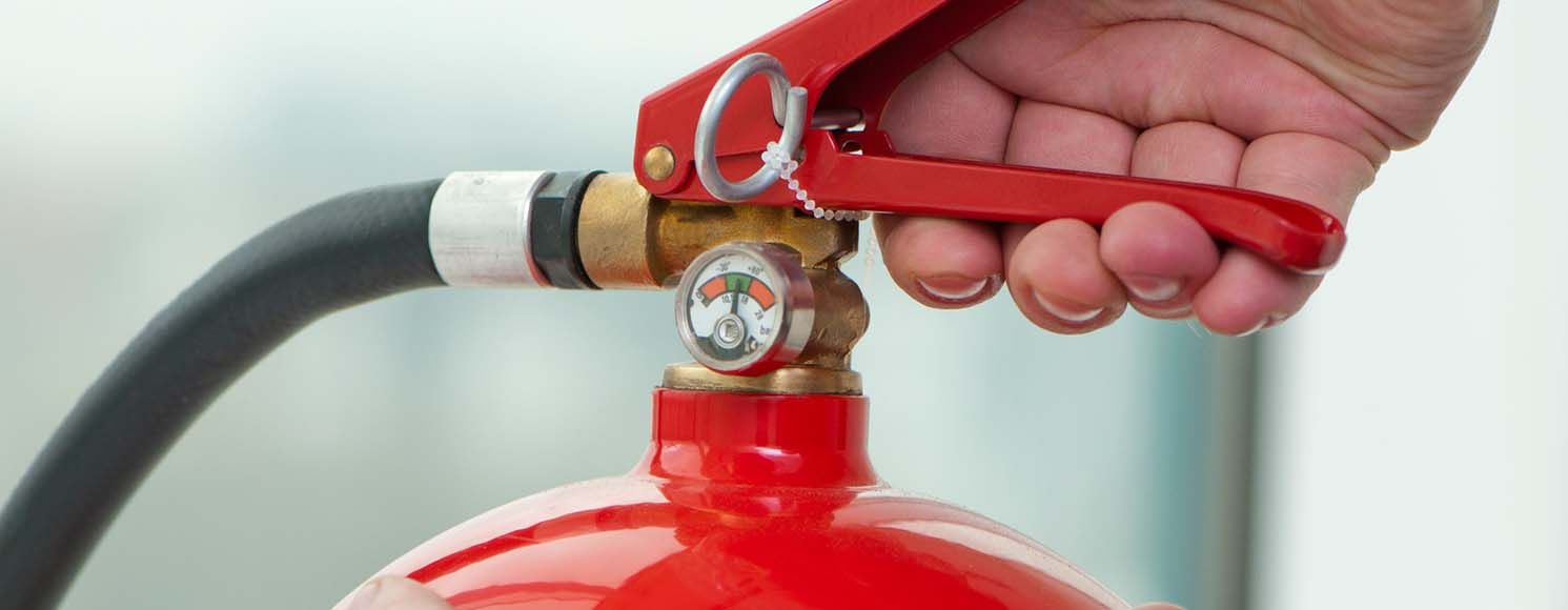 Handbrandsläckare röd