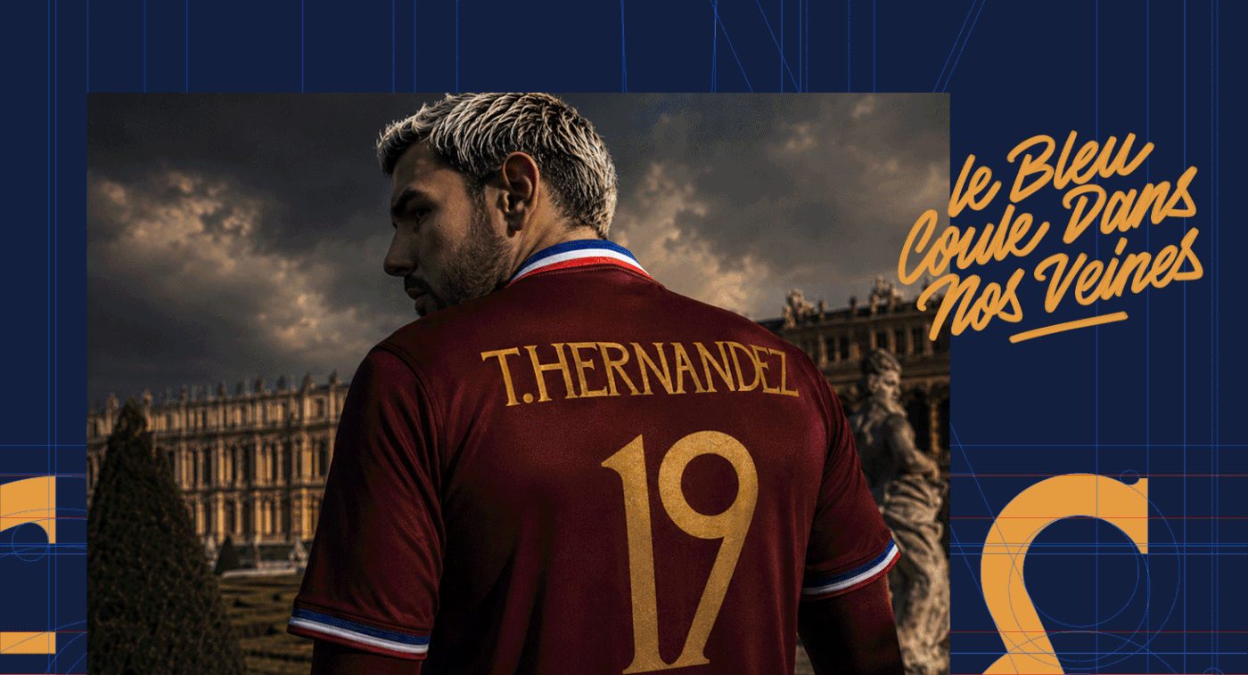 Poster of a footballer in a red THERNANDEZ 19 jersey, with gold “le Bleu Coule Dans Nos Veines” text on a blue grid.