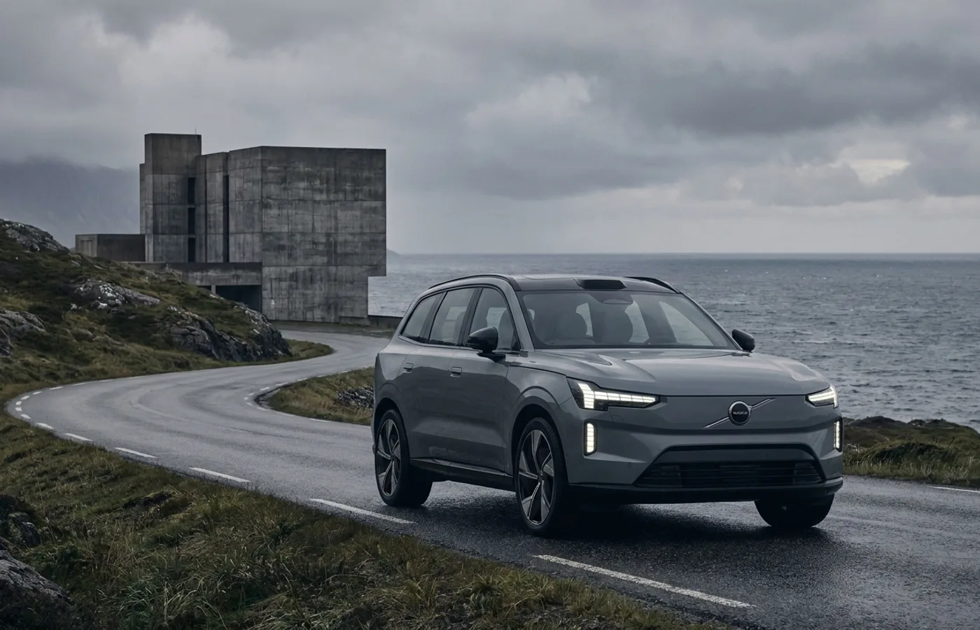 A contemporary Volvo parked on a Scandinavian coastal road with the iconic Thor's Hammer headlights, overcast Nordic light, desaturated palette
