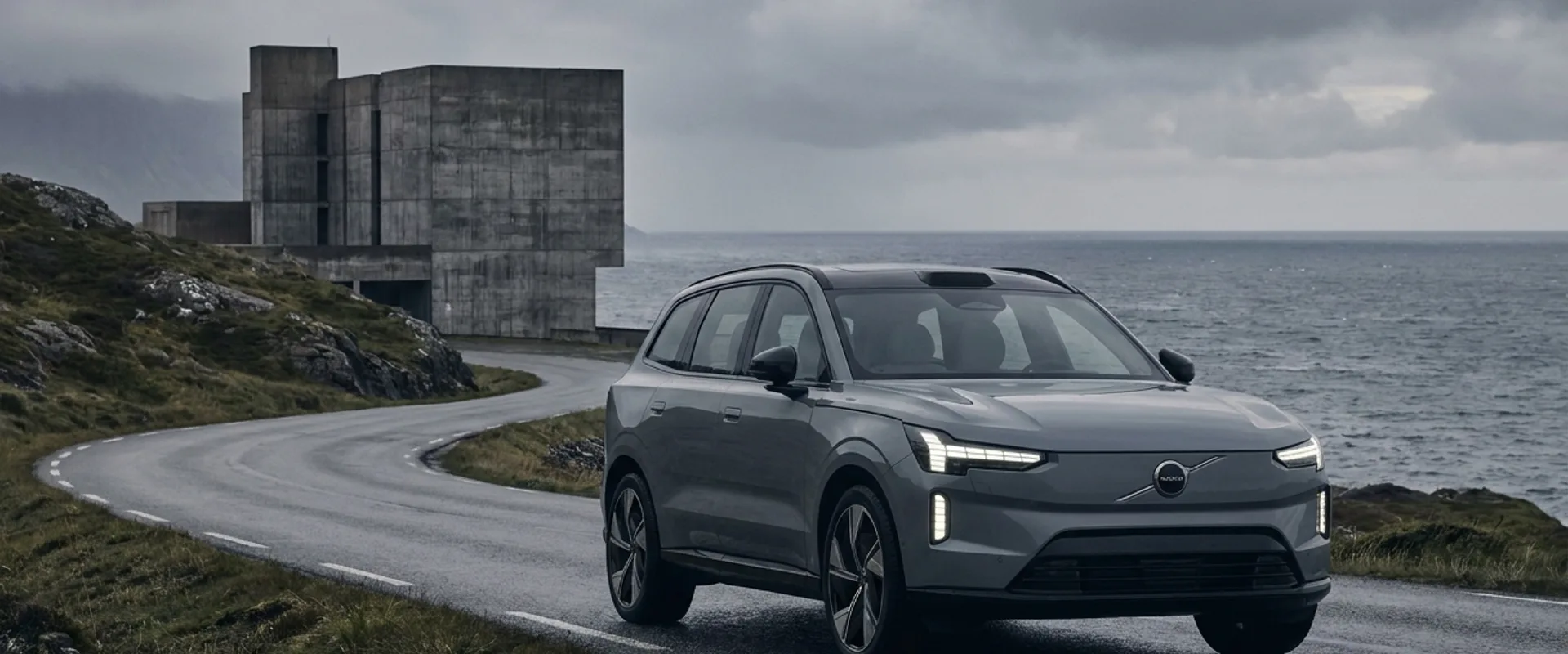 A contemporary Volvo parked on a Scandinavian coastal road with the iconic Thor's Hammer headlights, overcast Nordic light, desaturated palette