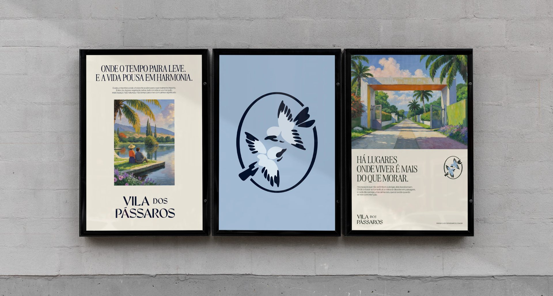 Three black-framed posters on a gray wall show landscape scenes, a blue bird emblem, and the brand text “VILA DOS PÁSSAROS”.
