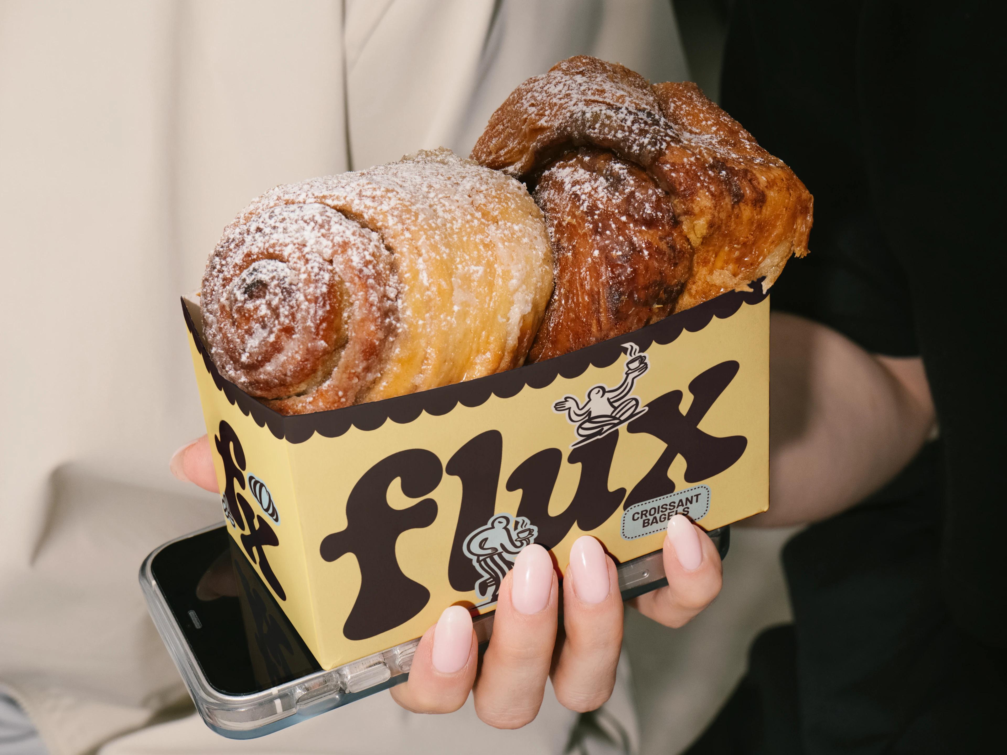 Flux Coffee: Artsby Emde's Bean-Mascot Identity for a Conceptual Café