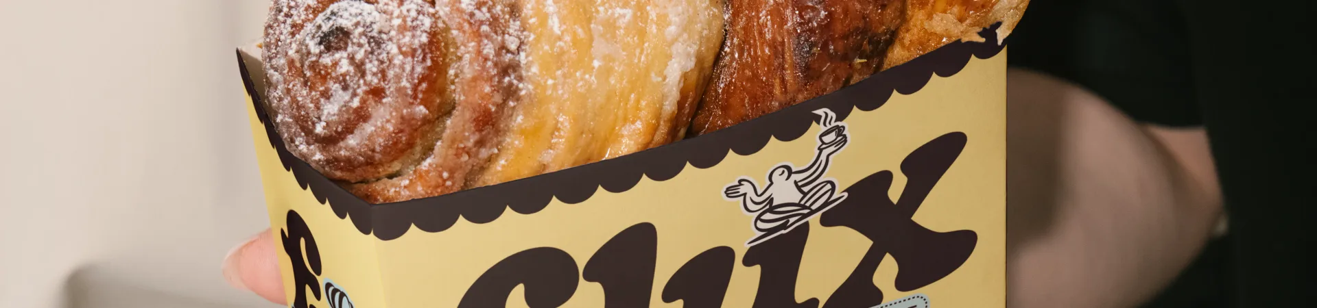 Flux Coffee: Artsby Emde's Bean-Mascot Identity for a Conceptual Café