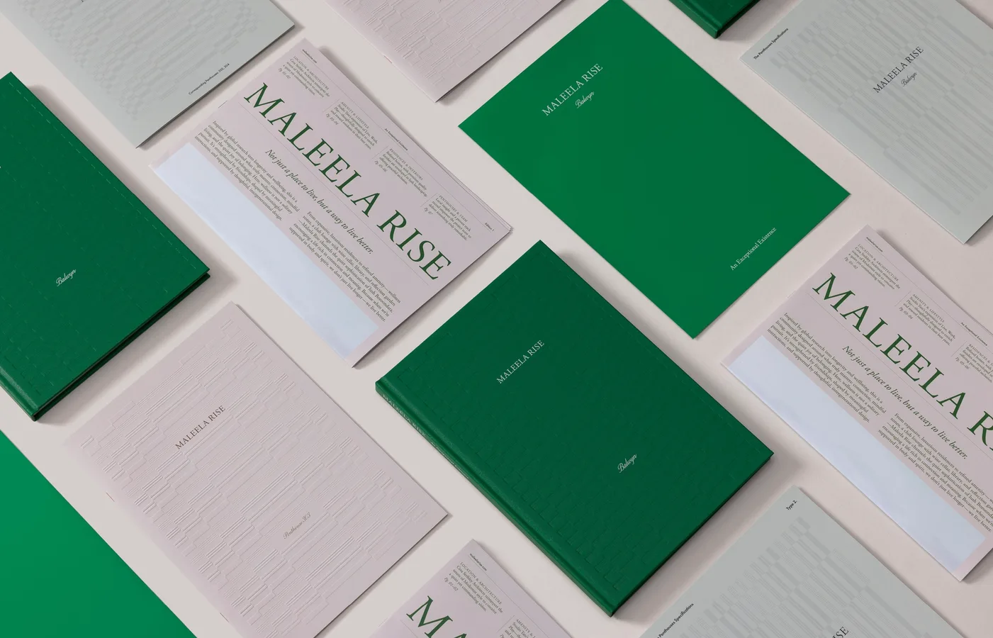 Maleela Rise stationery in green and cream laid out in a grid