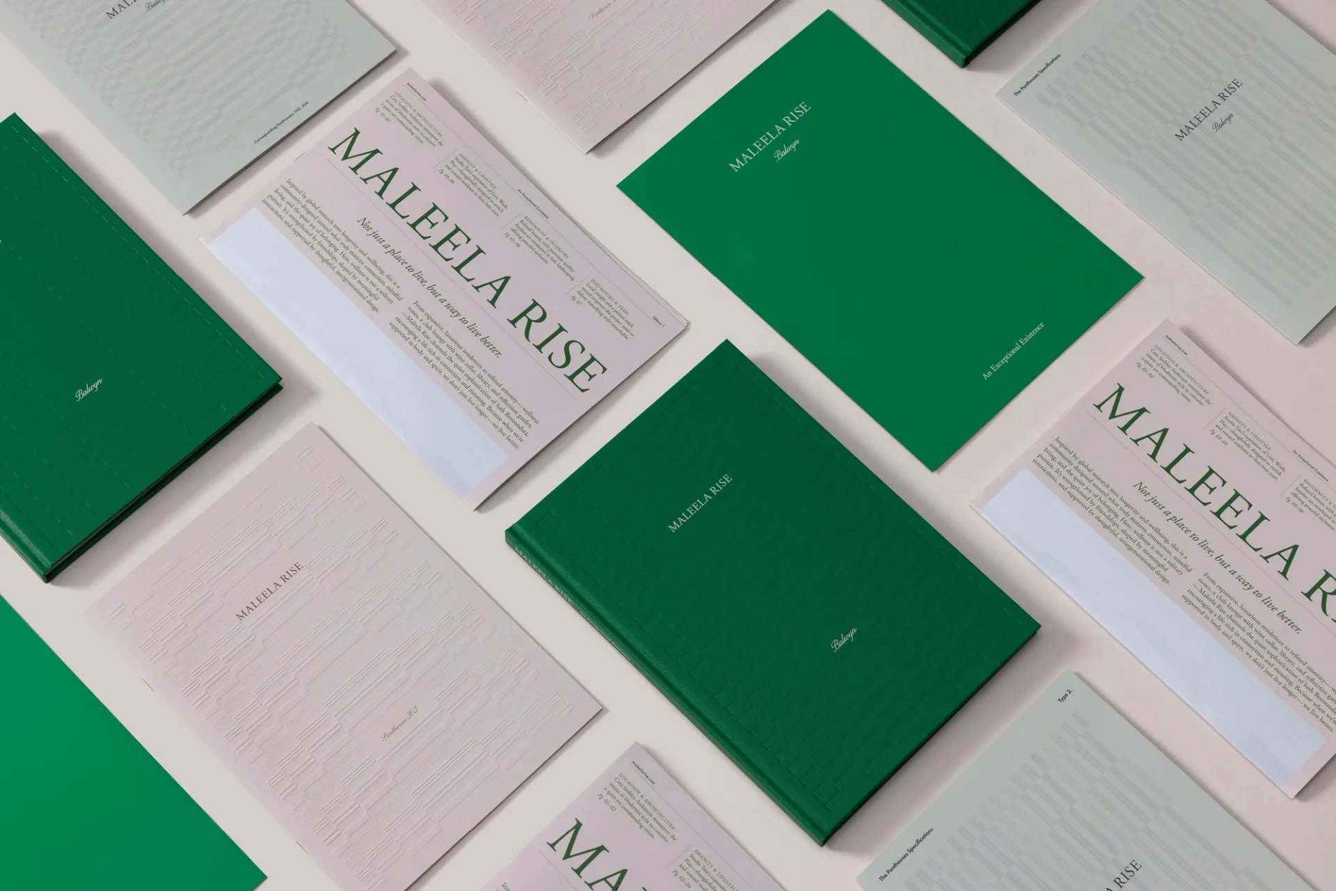Maleela Rise stationery in green and cream laid out in a grid
