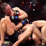 Rousey makes stunning MMA return with trademark armbar submission over Carano