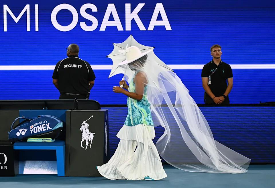 Naomi Osaka tones down her walk-on outfit for second-round match at the Australian Open
